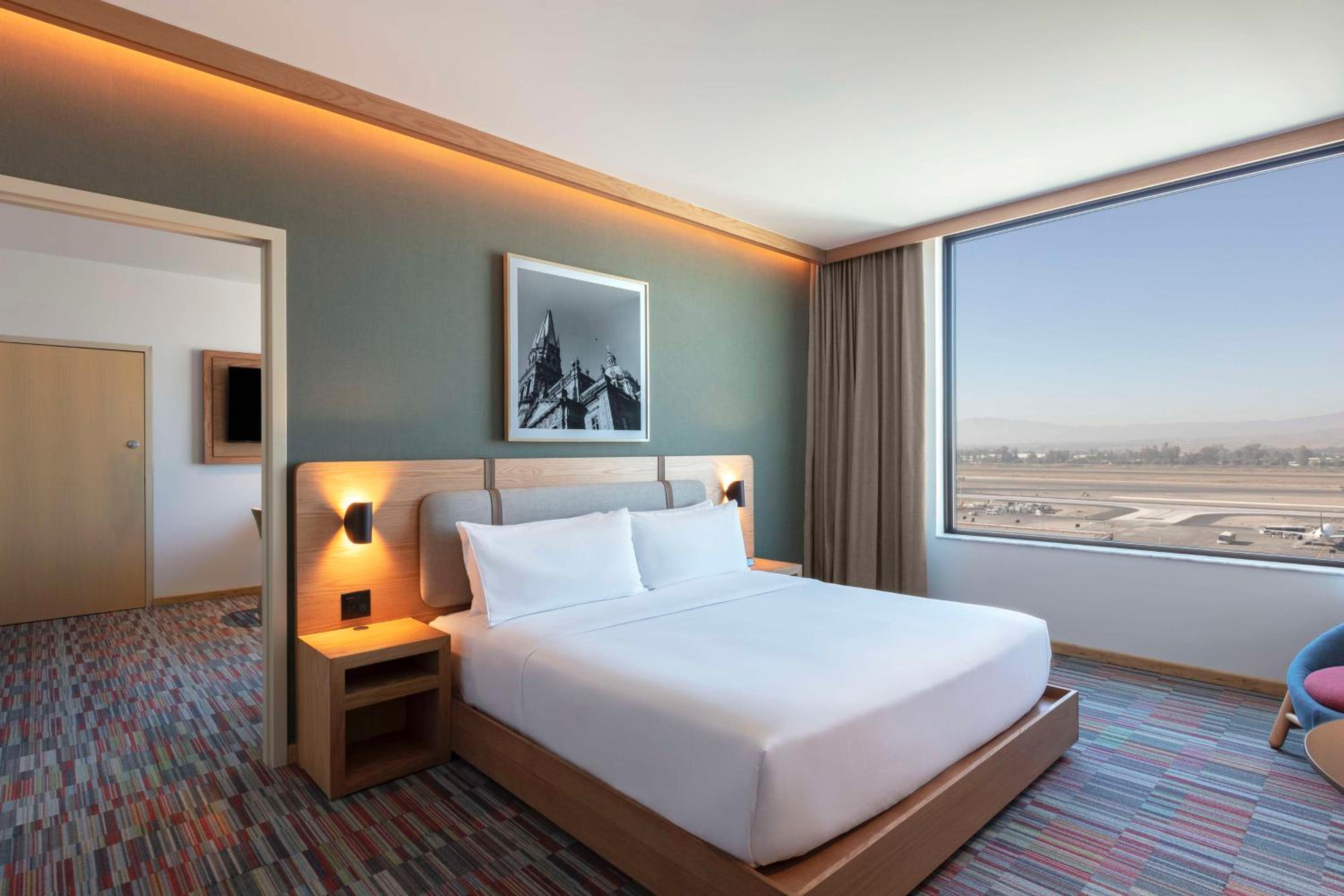 One-Bedroom King Suite with Airport View - Photo 1
