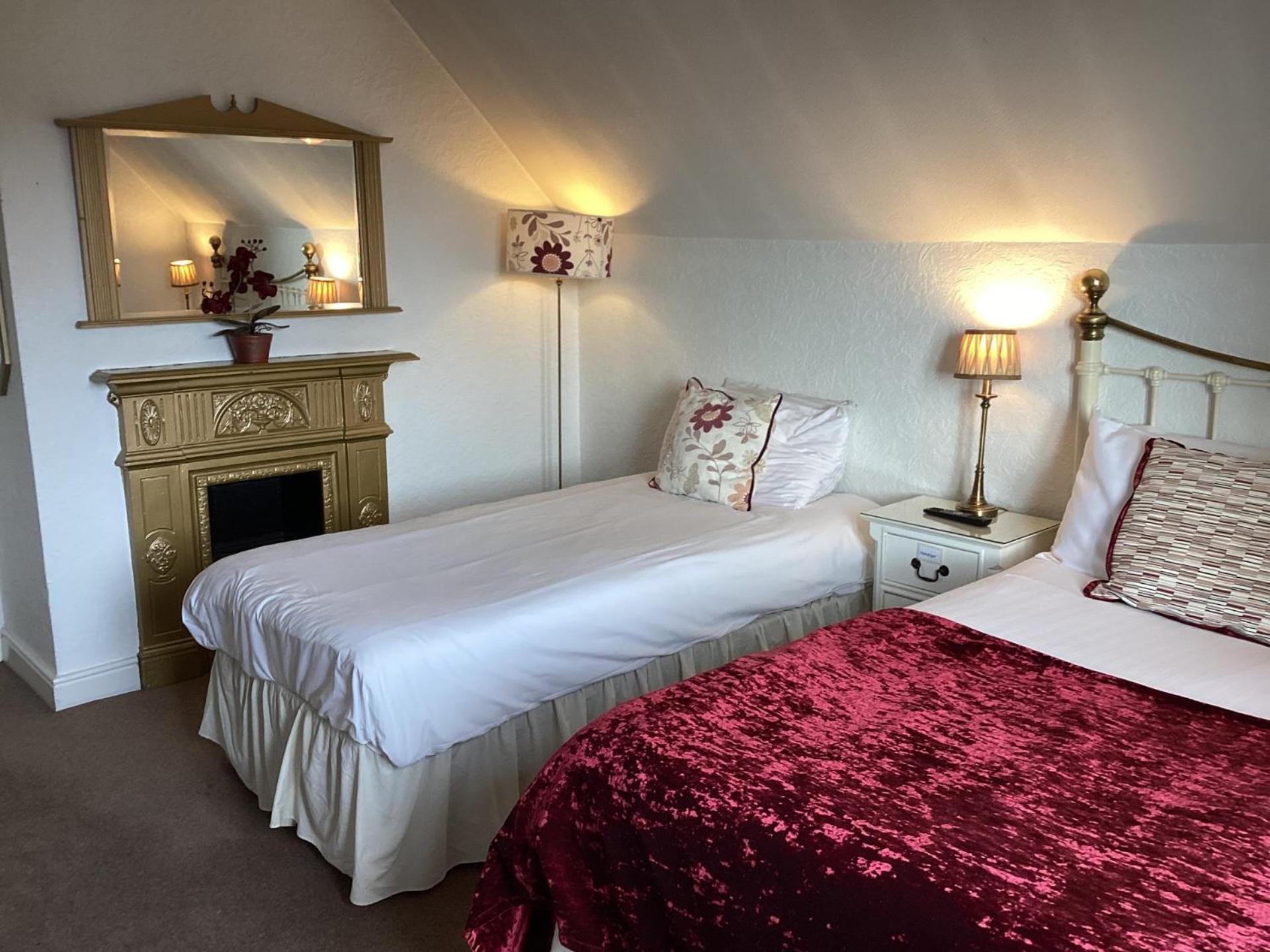 Deluxe Triple Room