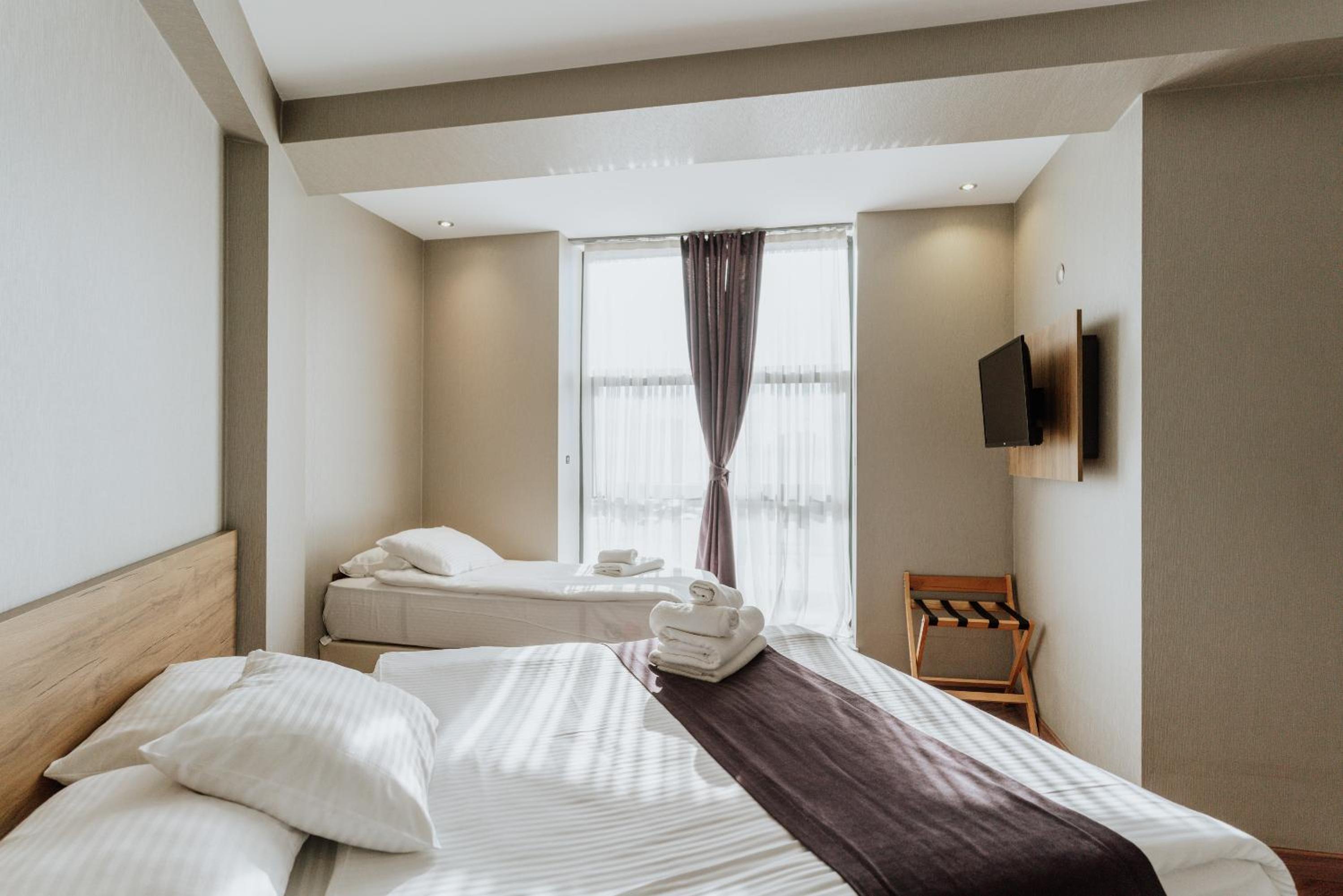 Triple Room - Photo 1