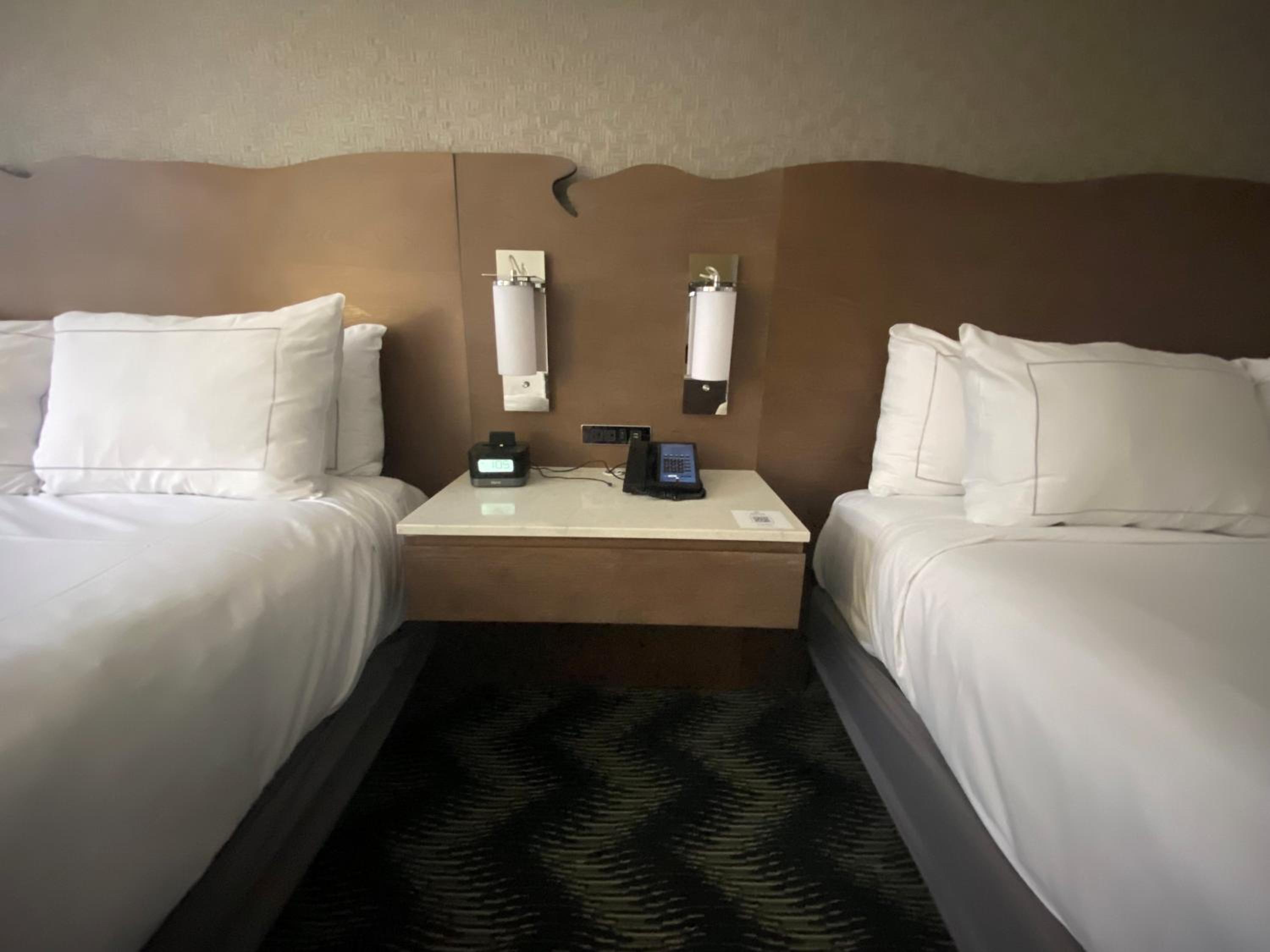 Queen Room with Two Queen Beds and Roll-In Shower - Mobility Access at Hilton Houston North in Houston