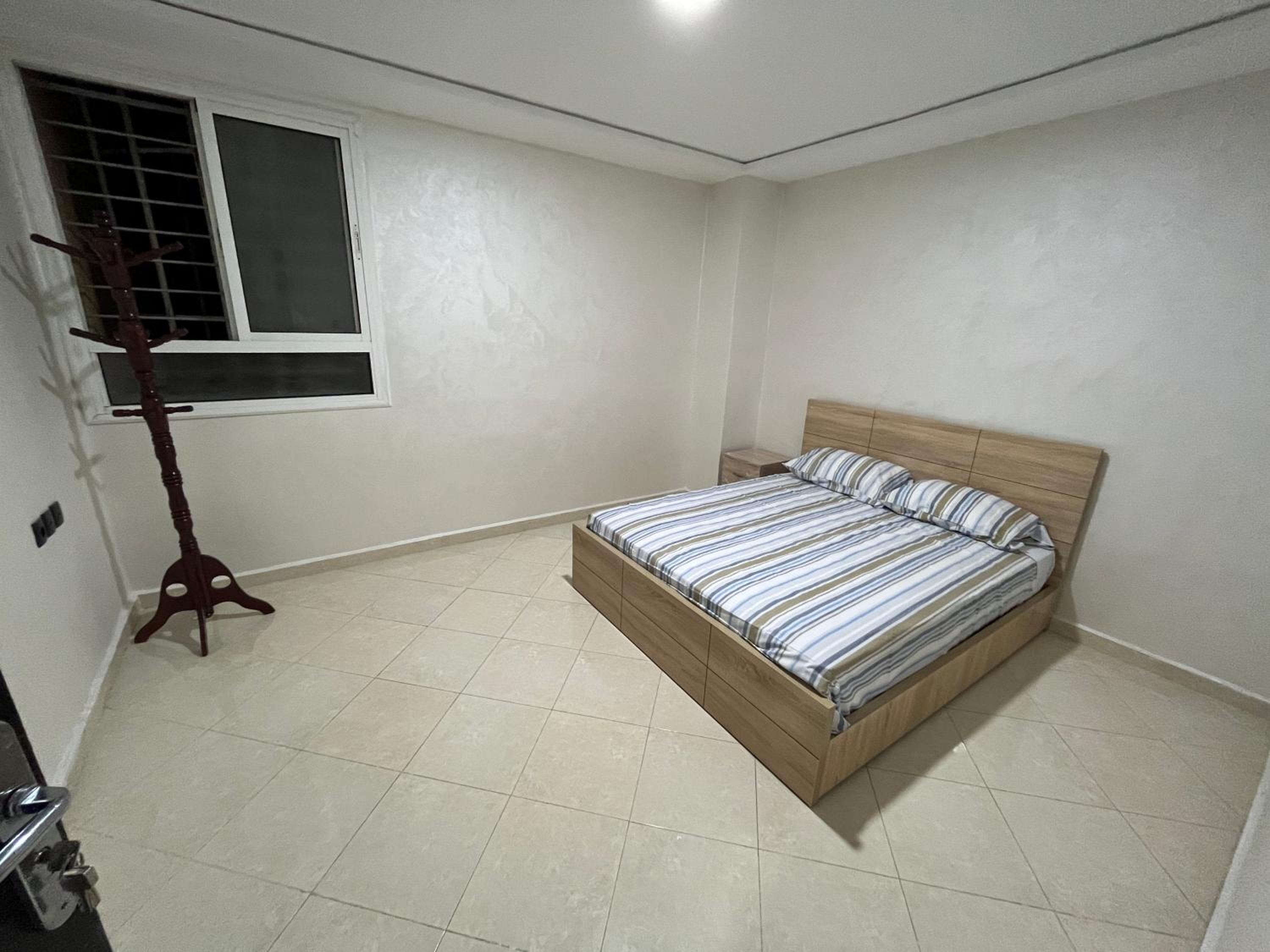 Three-Bedroom Apartment photo 1
