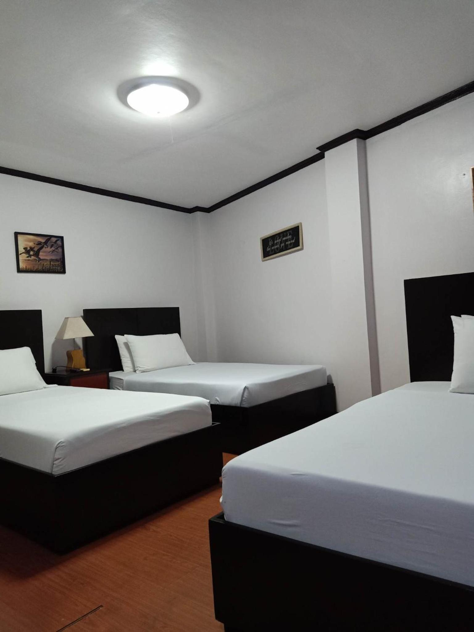 Deluxe Triple Room - Photo 1