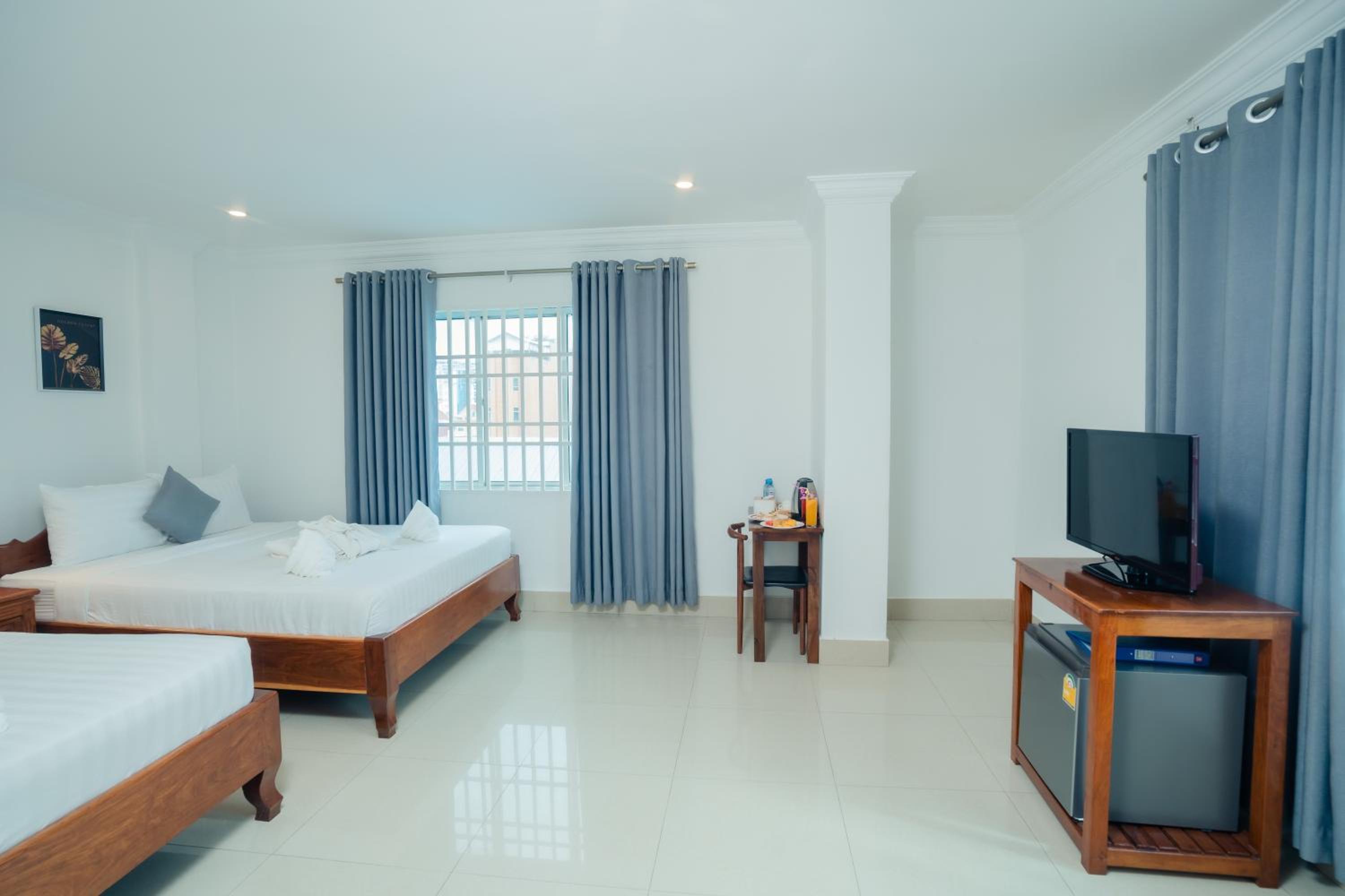 Deluxe Triple Room - Photo 7