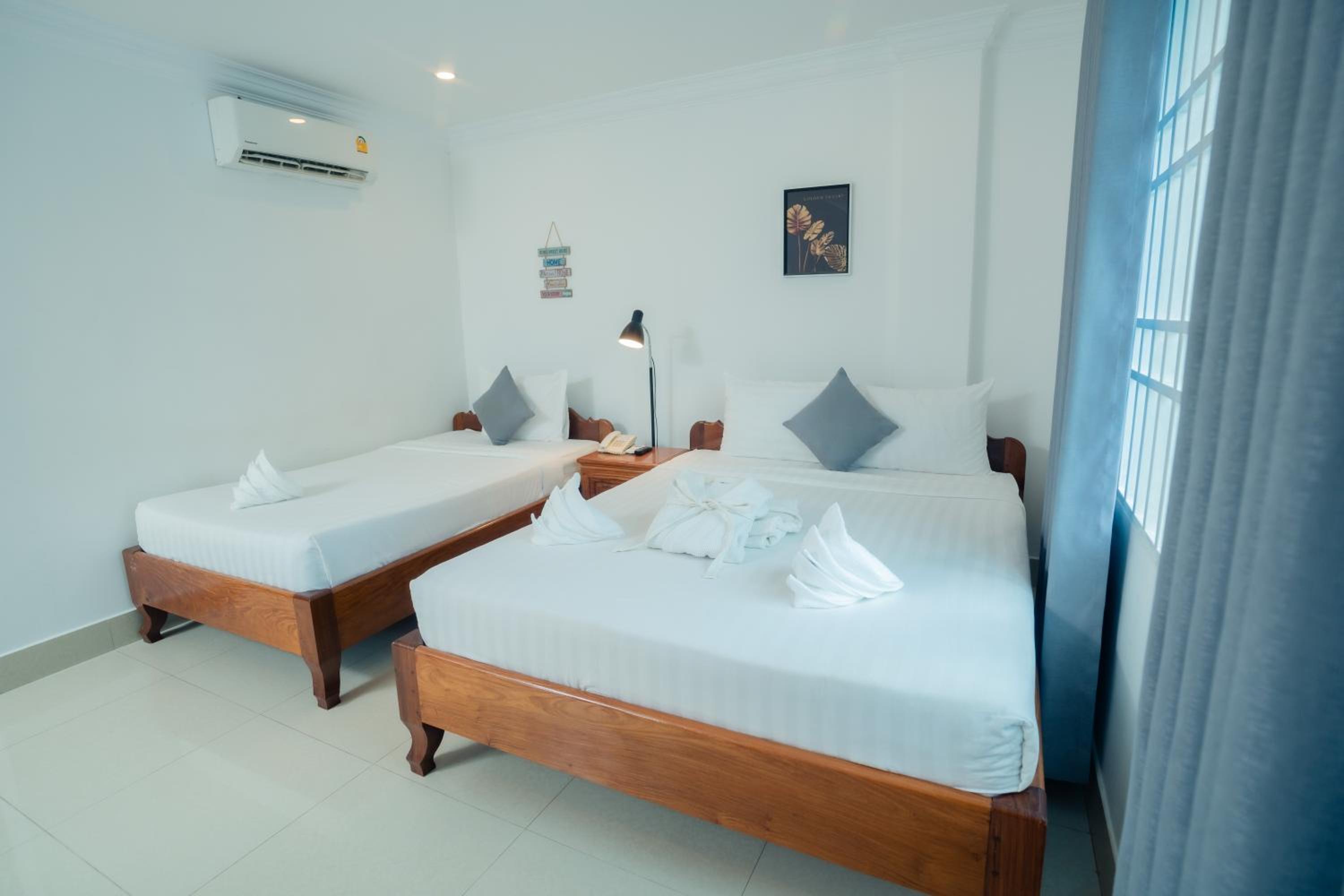 Deluxe Triple Room - Photo 6