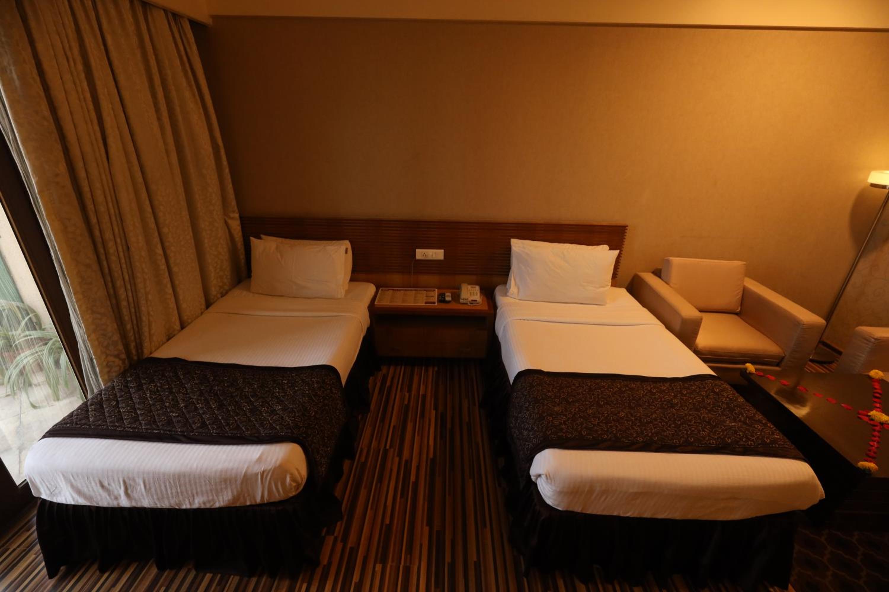Quadruple Room with Garden View – Complimentary Shuttle Pickup and Drop to Sai Baba Temple (Gate 2) photo