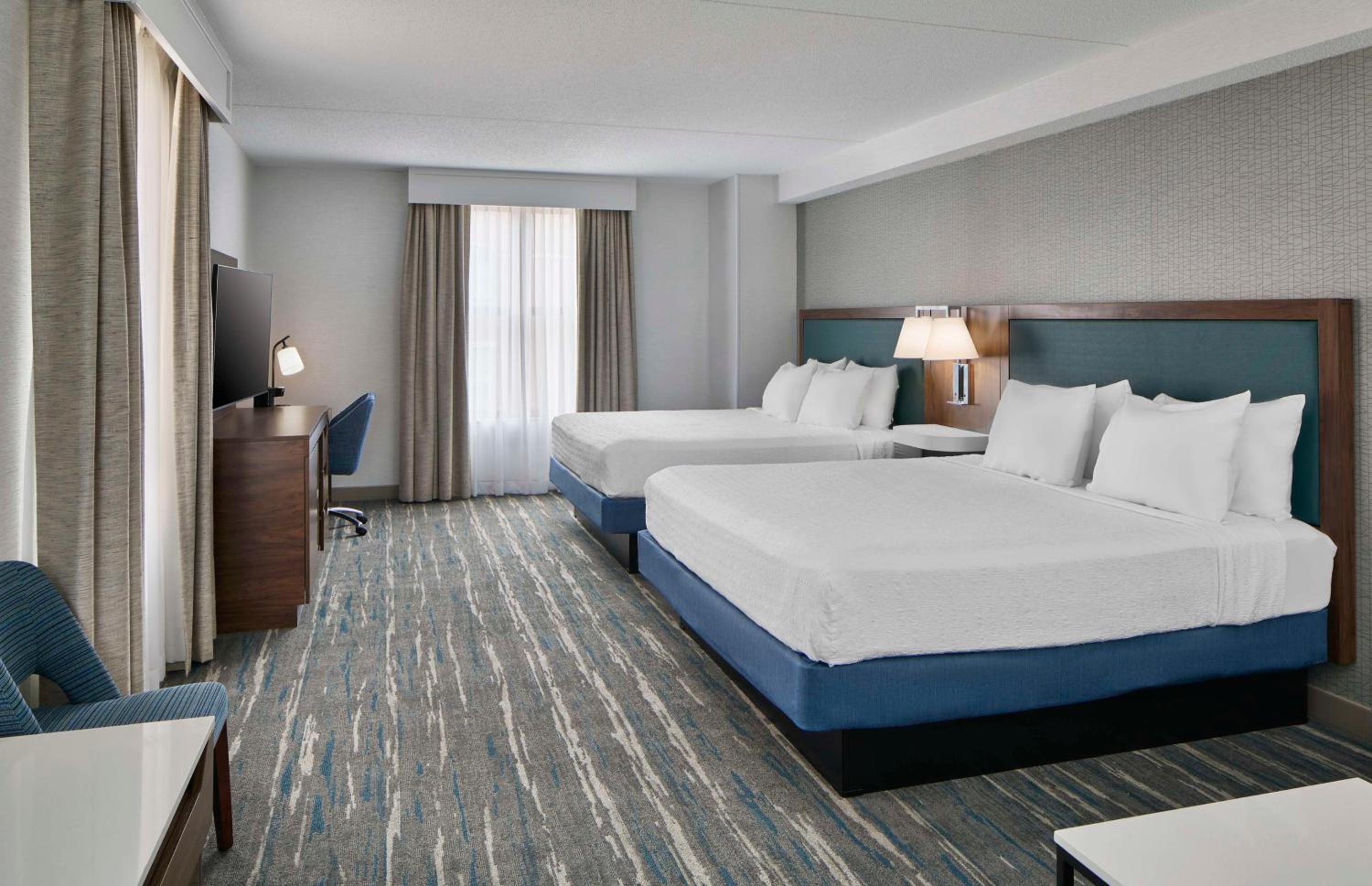 Room with Two King Beds and Sofa Bed - Photo 1