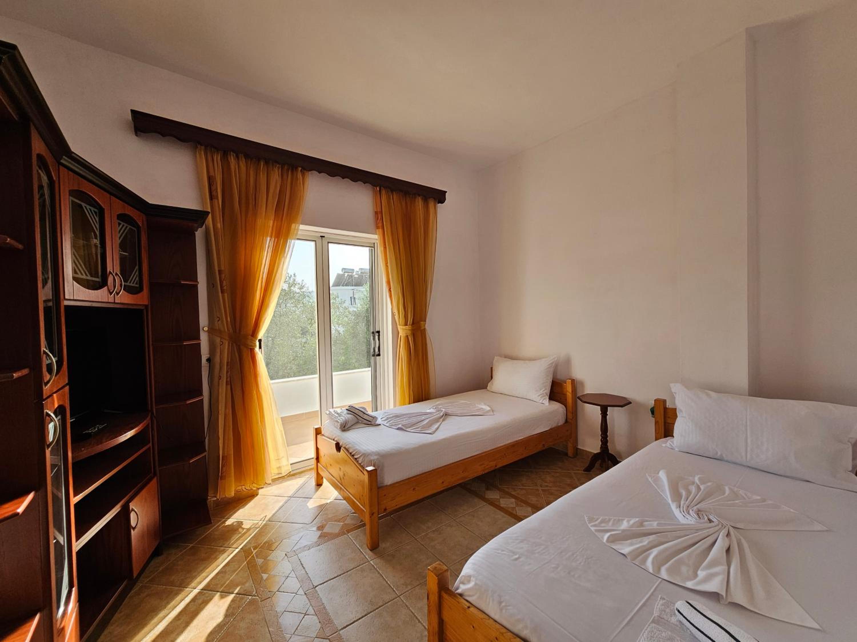 Three-Bedroom Apartment with Balcony photo 1