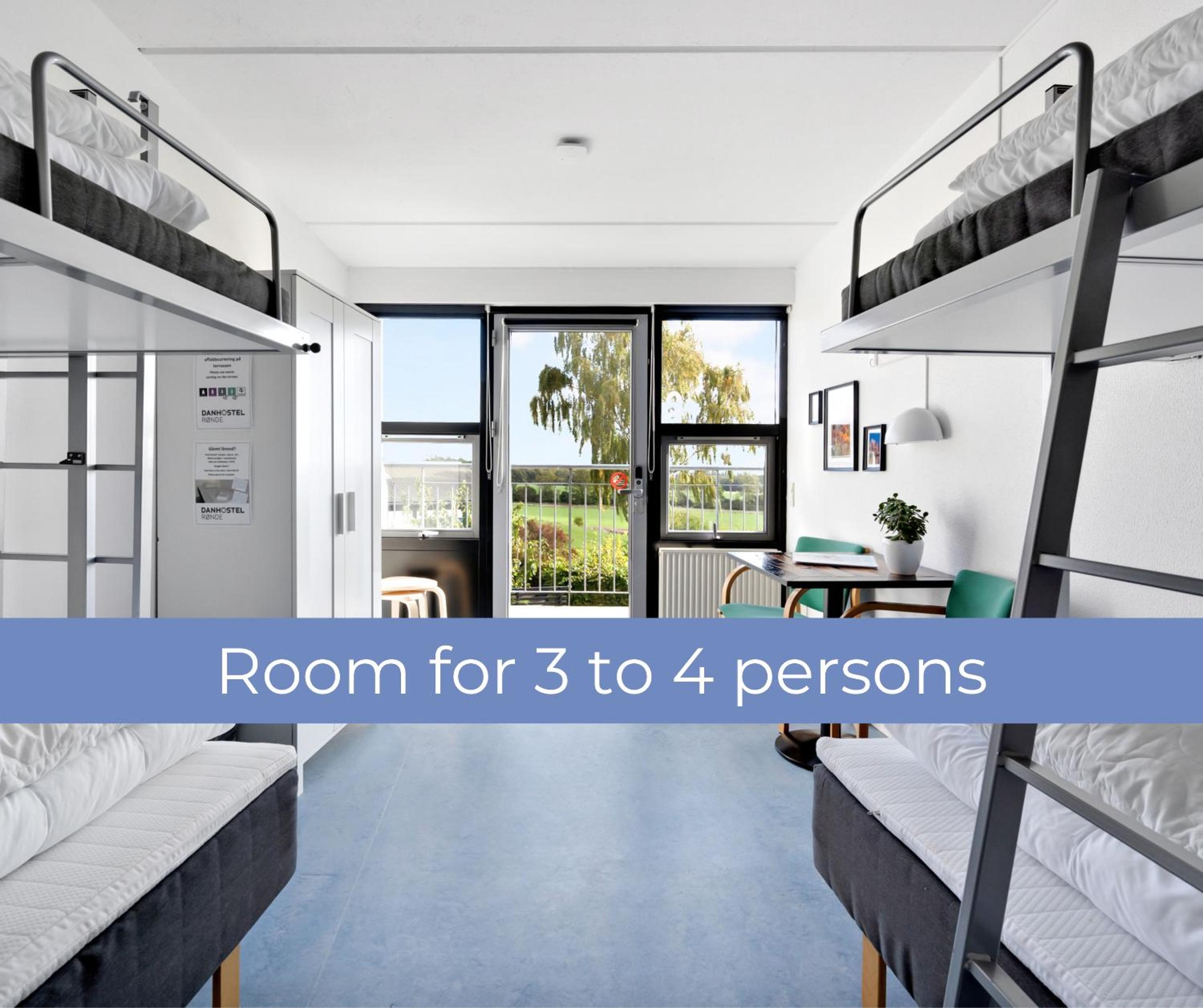 Quadruple Room with Private Bathroom - Photo 1