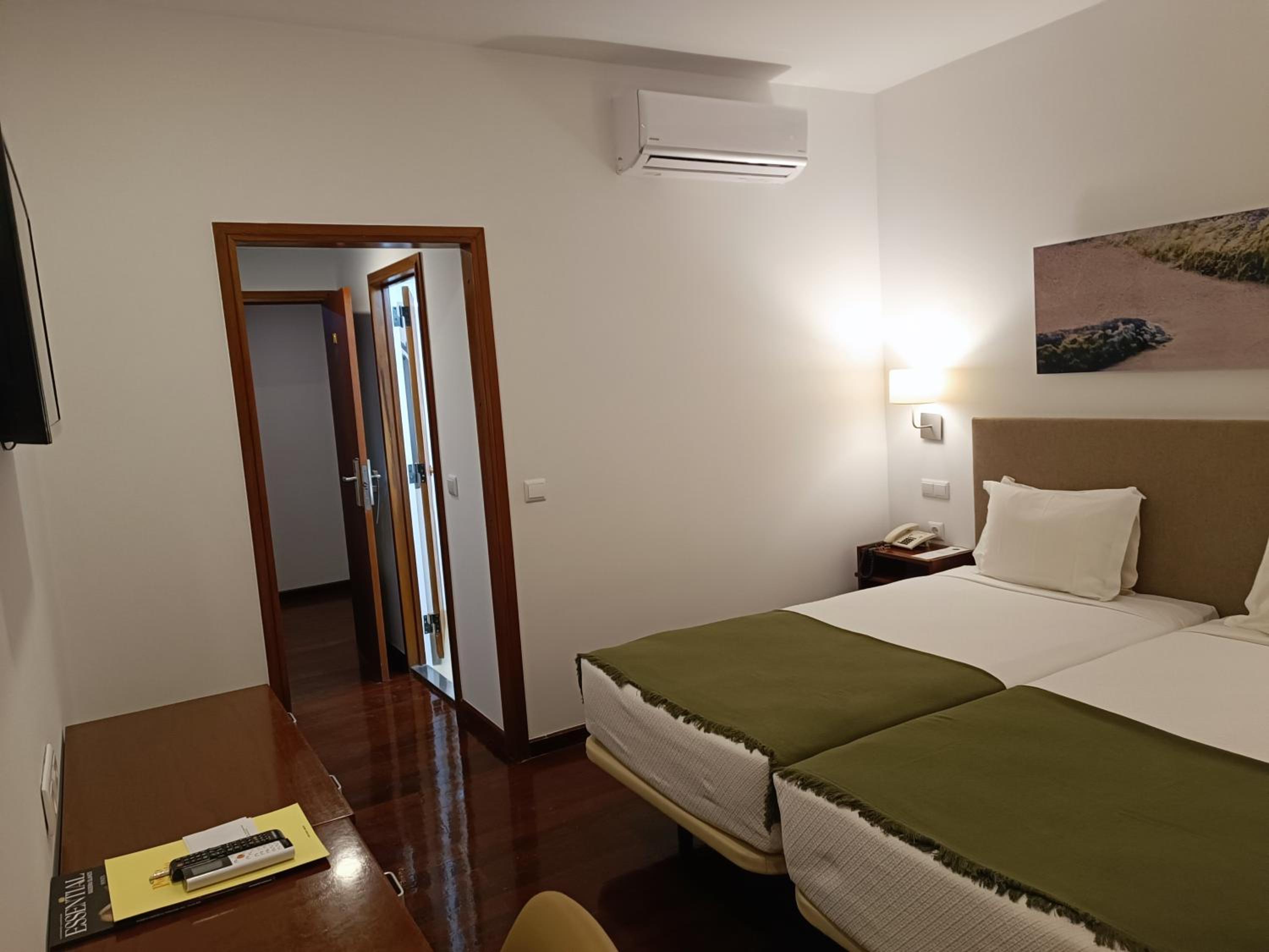 Double or Twin Room with Extra Bed (2 Adults + 1 Child)
