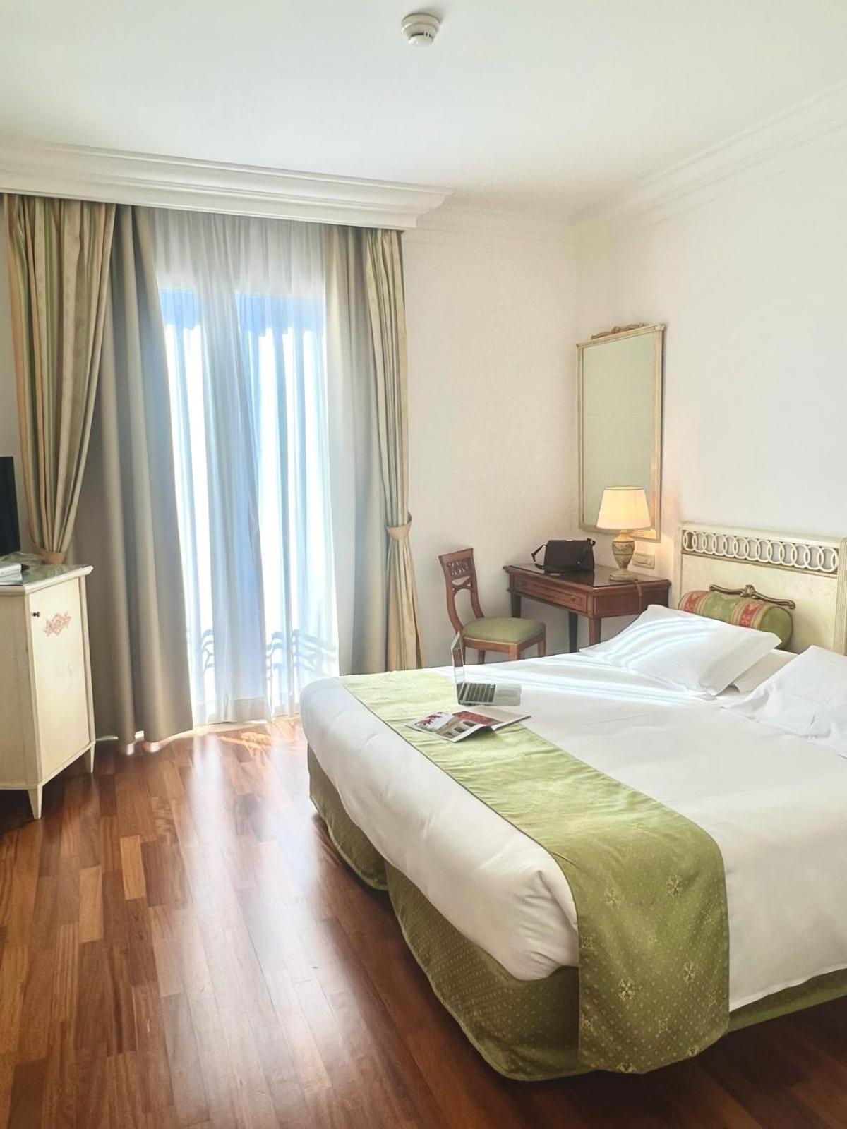 Double or Twin Room with Swimming Pool Access photo 3