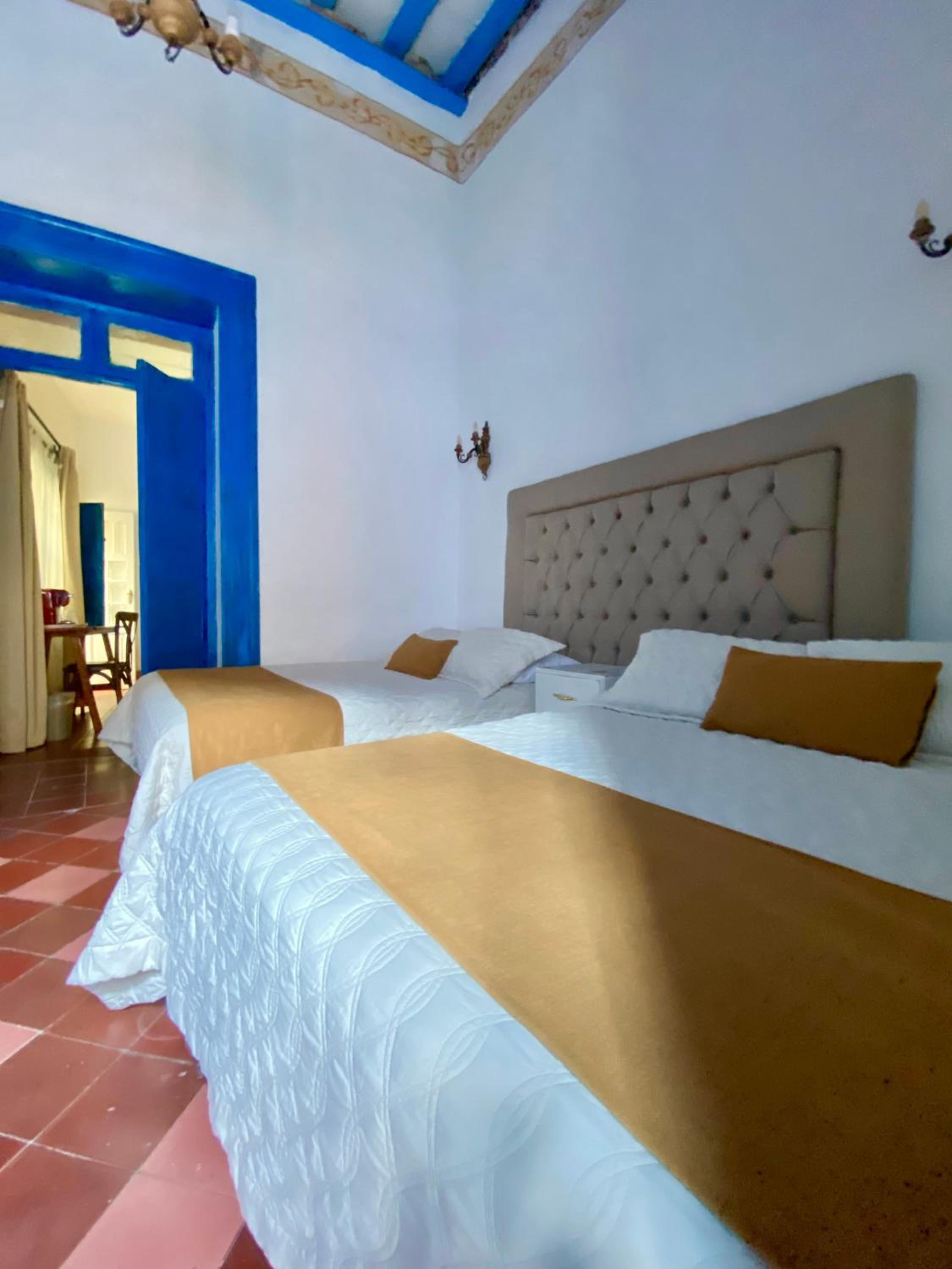 Triple Room with Balcony - Photo 19