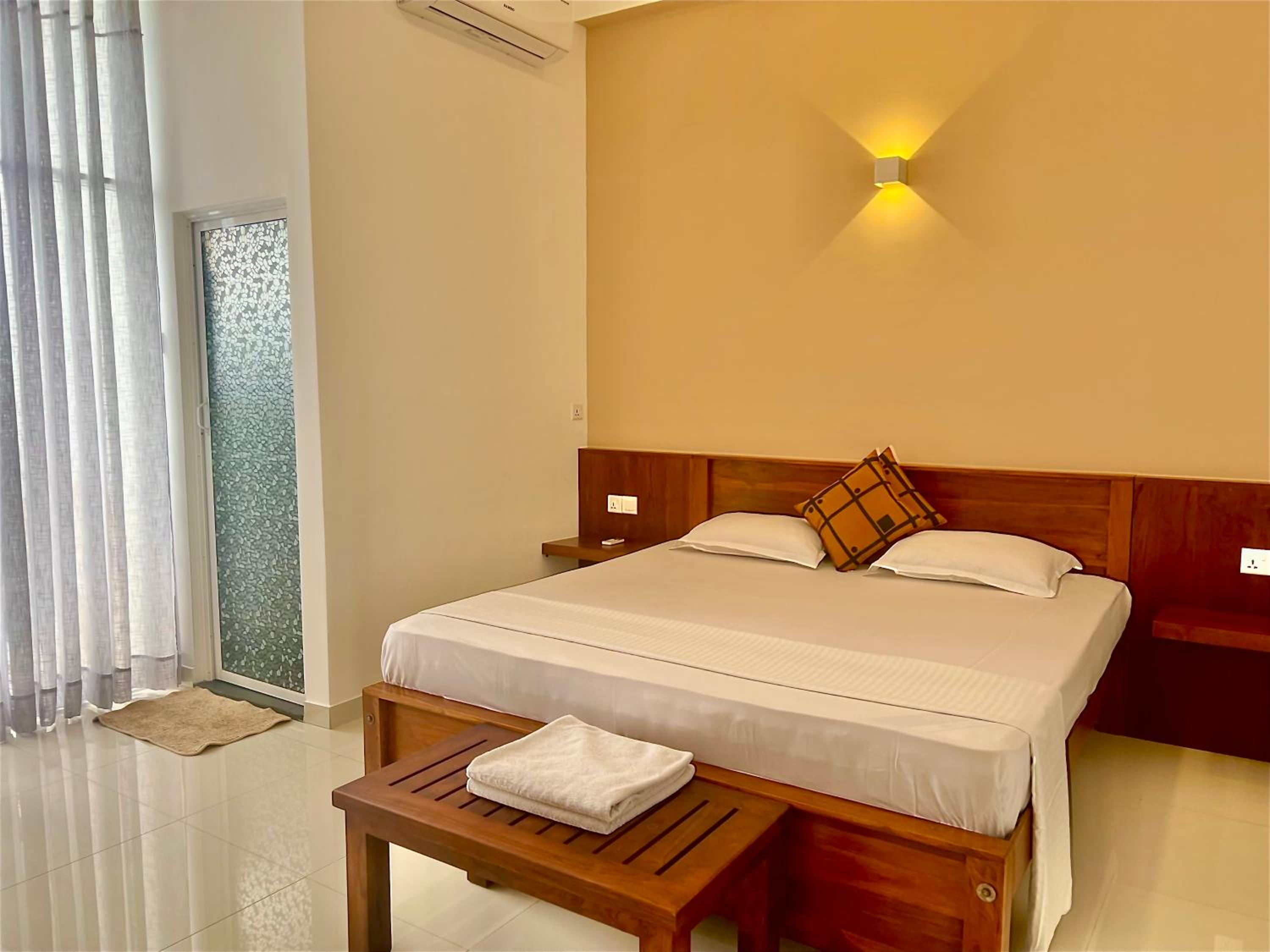 Double Room with Balcony (2 Adults + 1 Child) photo 1