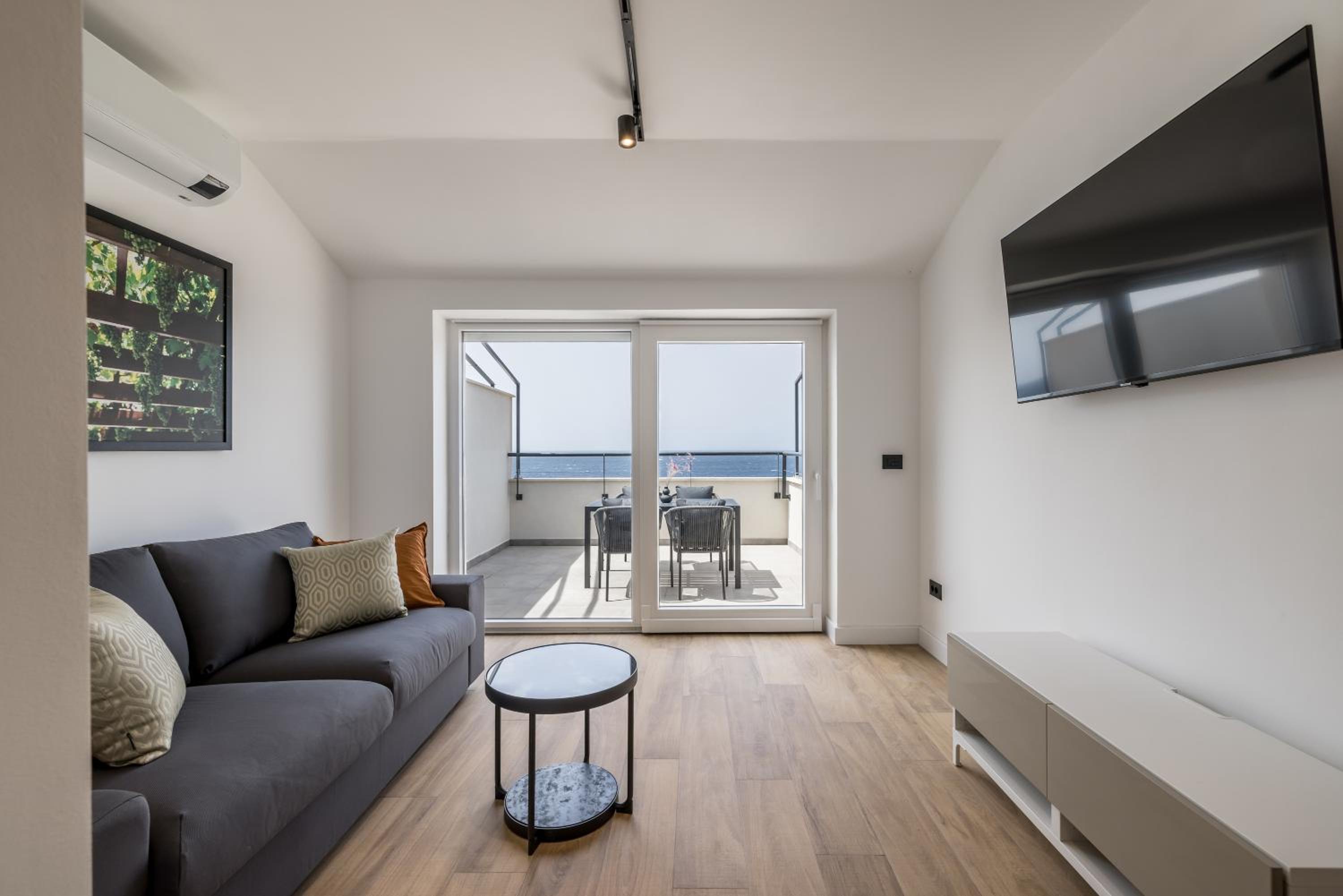 One-Bedroom Apartment with Balcony and Sea View