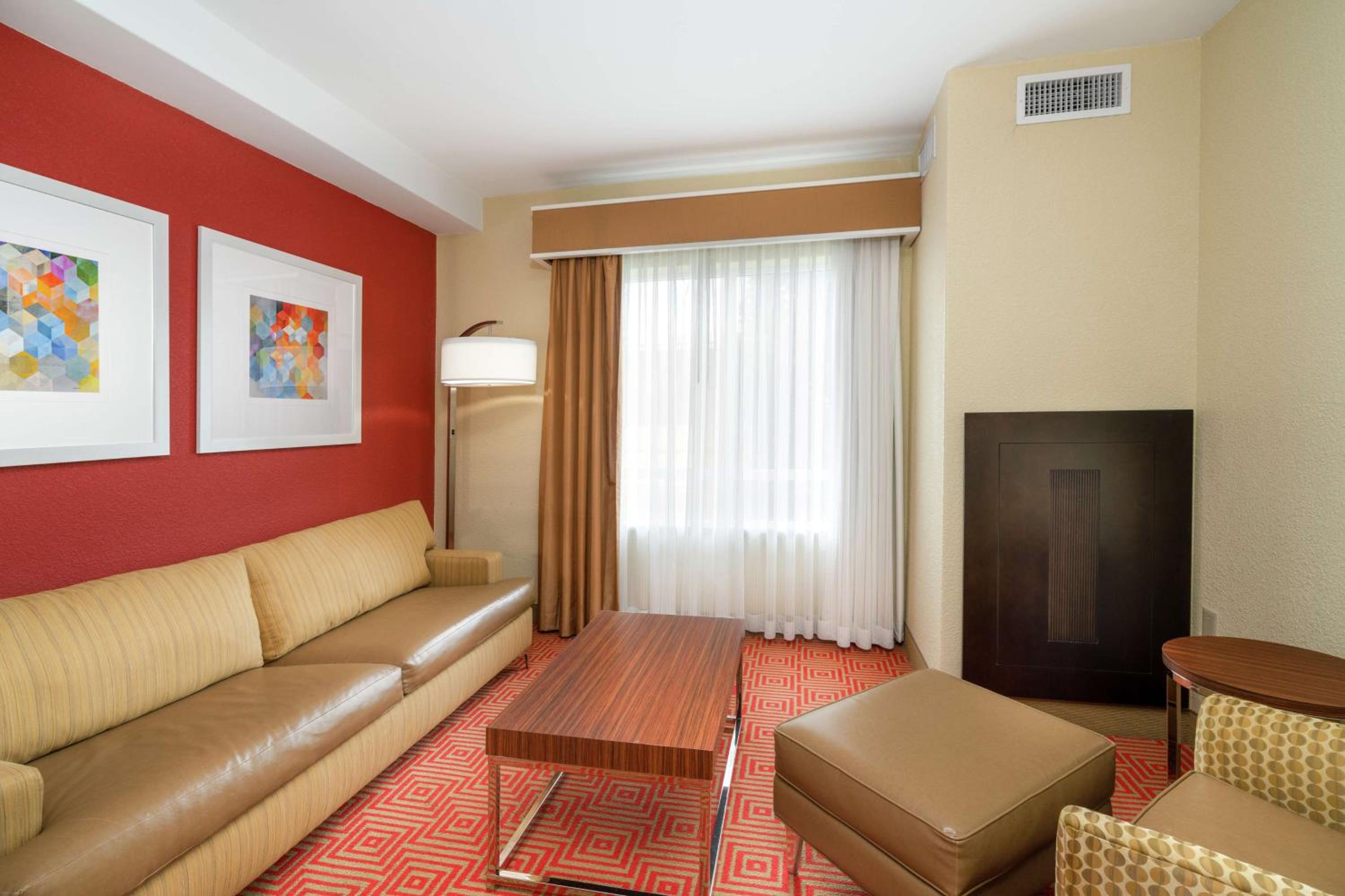 Deluxe Queen Room with Two Queen Beds and Sofa Bed - Photo 1