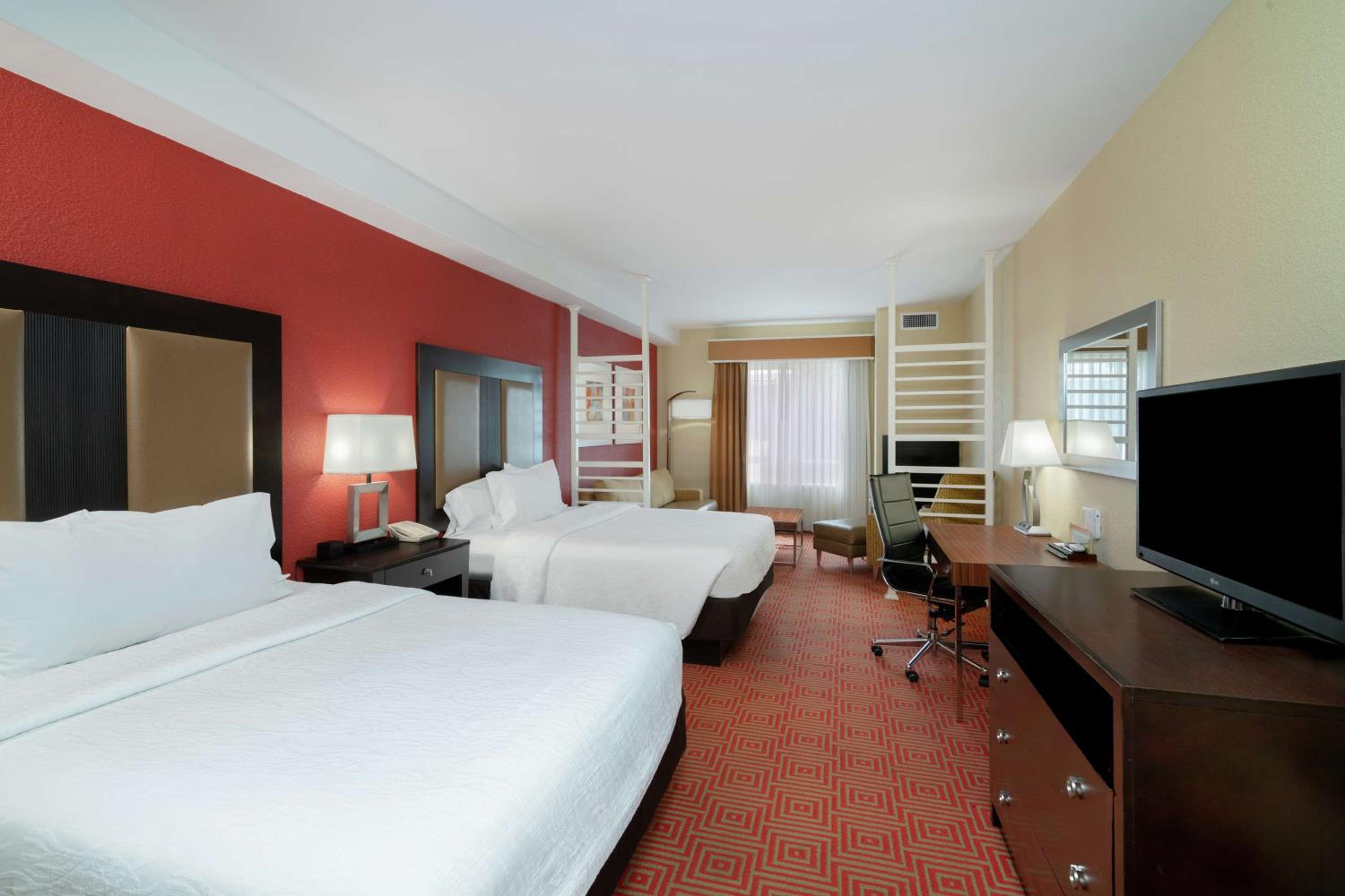 Deluxe Queen Room with Two Queen Beds and Sofa Bed - Photo 3