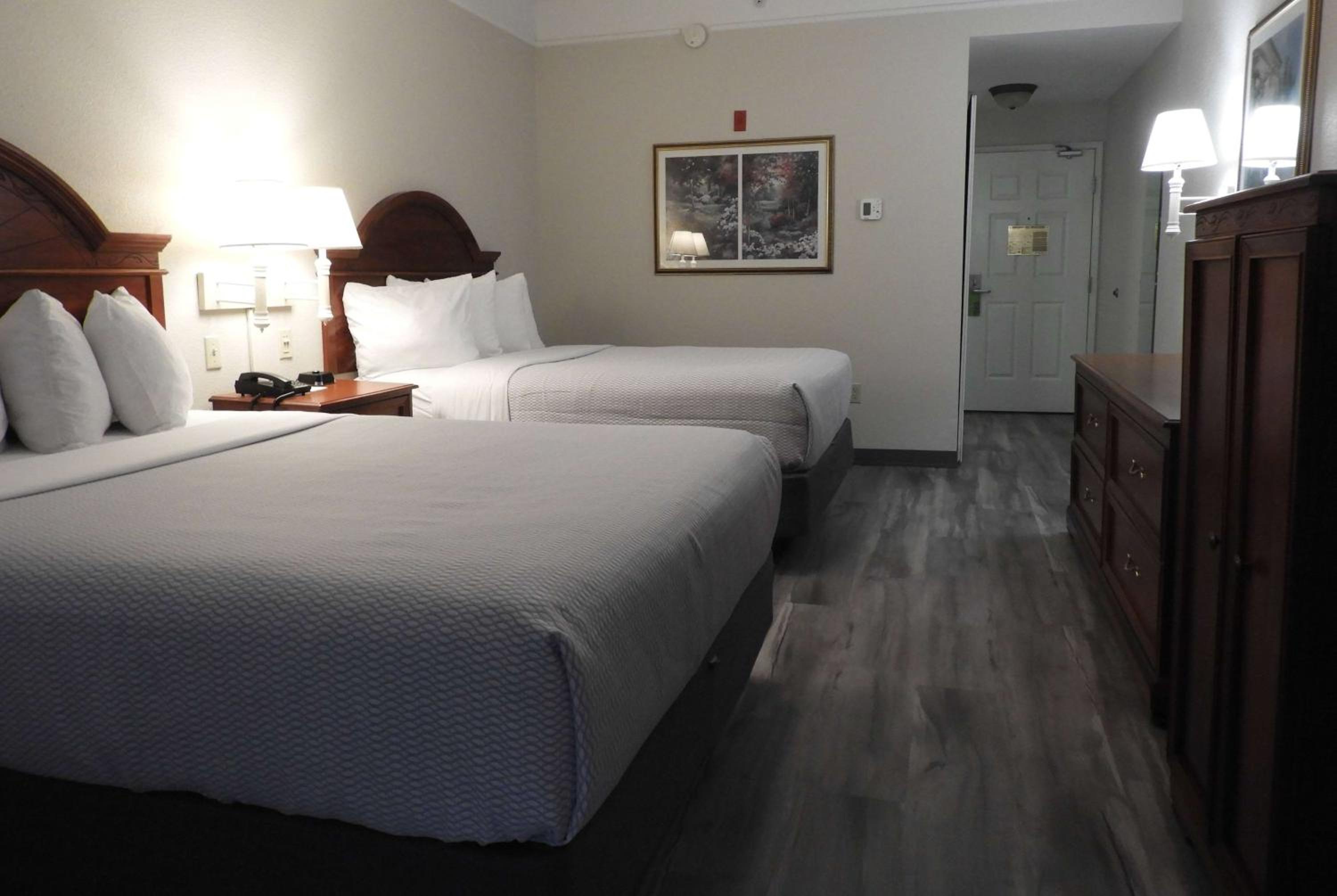 Deluxe Queen Room with Two Queen Beds - Photo 1