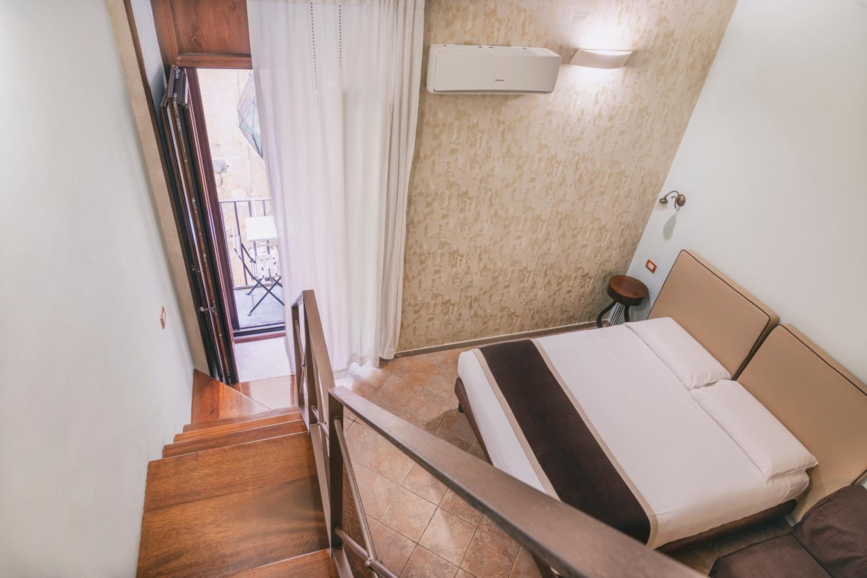 Quadruple Room with Balcony