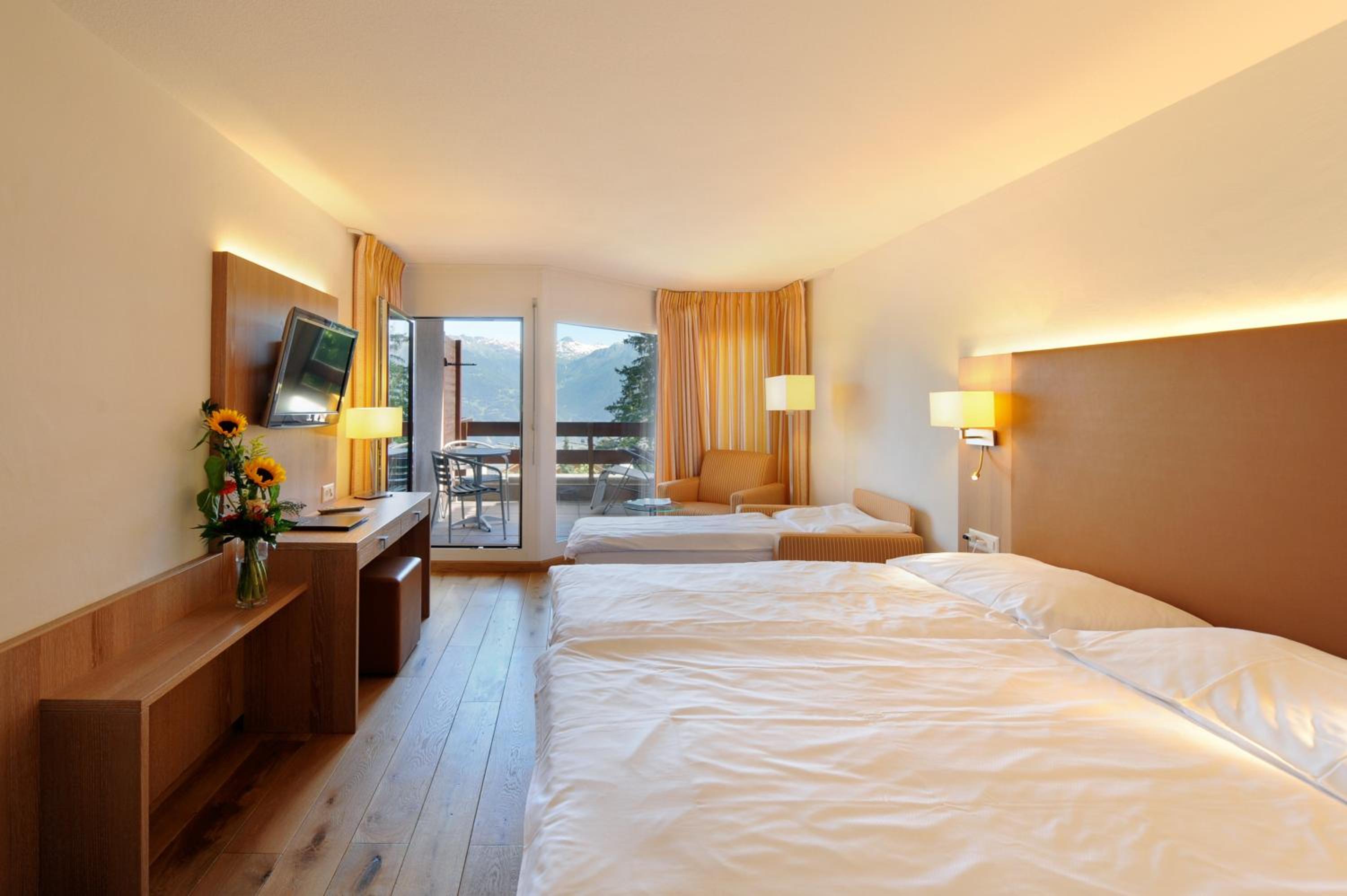 Family Room (2 Adults + 1 Child) with Balcony and Mountain View