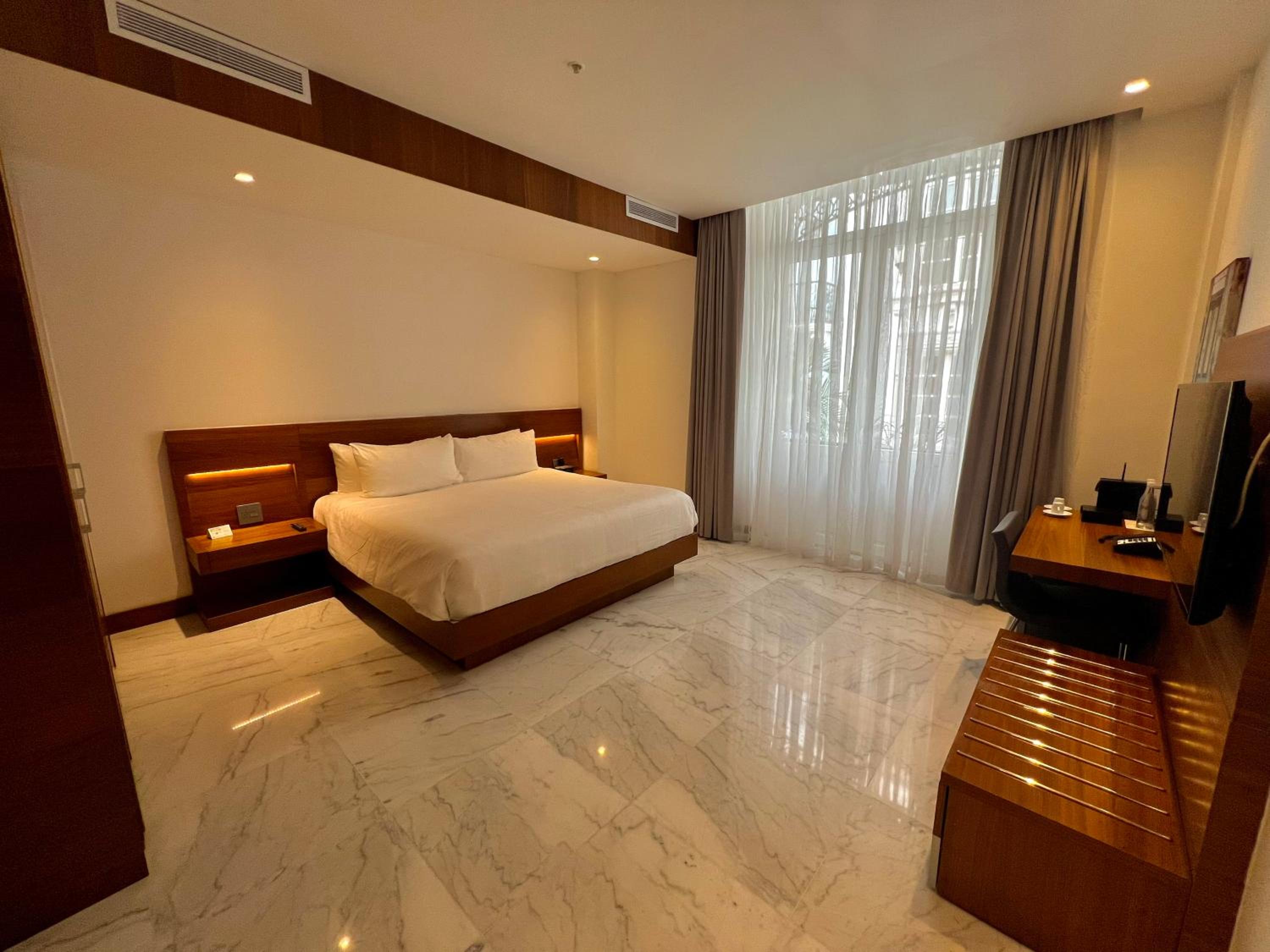 Deluxe Double Room with Balcony - Photo 2