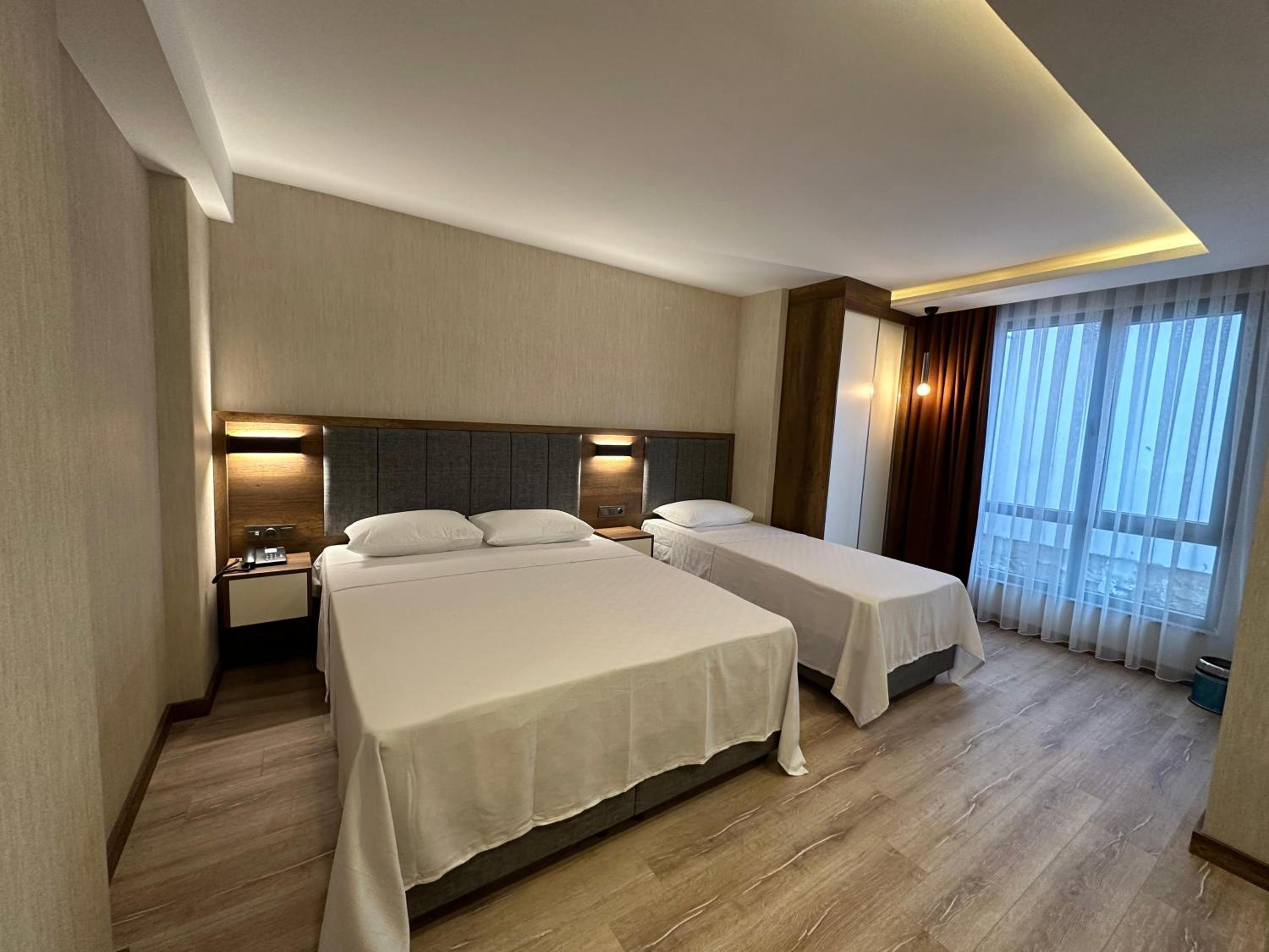 Luxury Triple Room photo 2