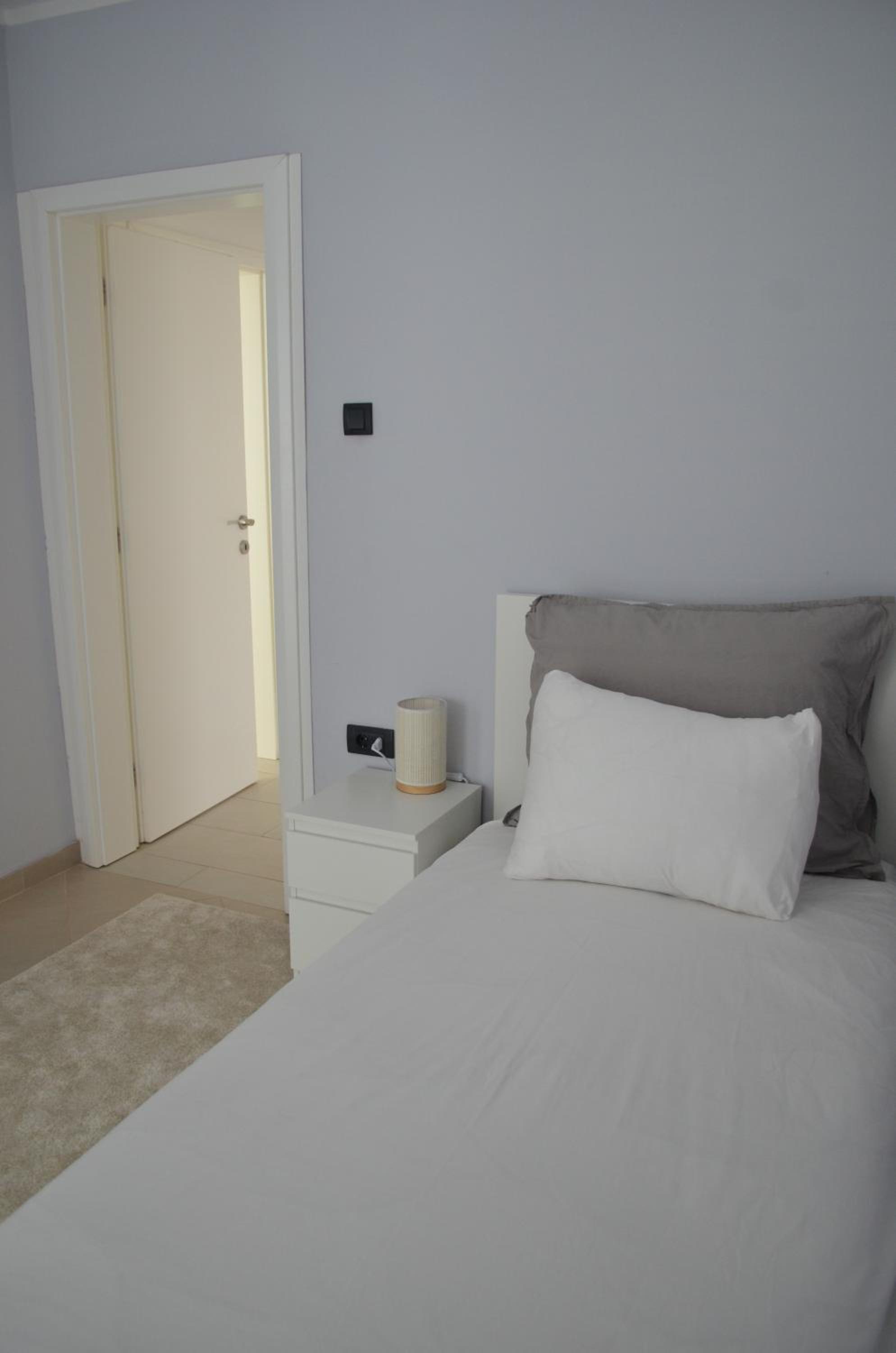 Three-Bedroom Apartment photo 2