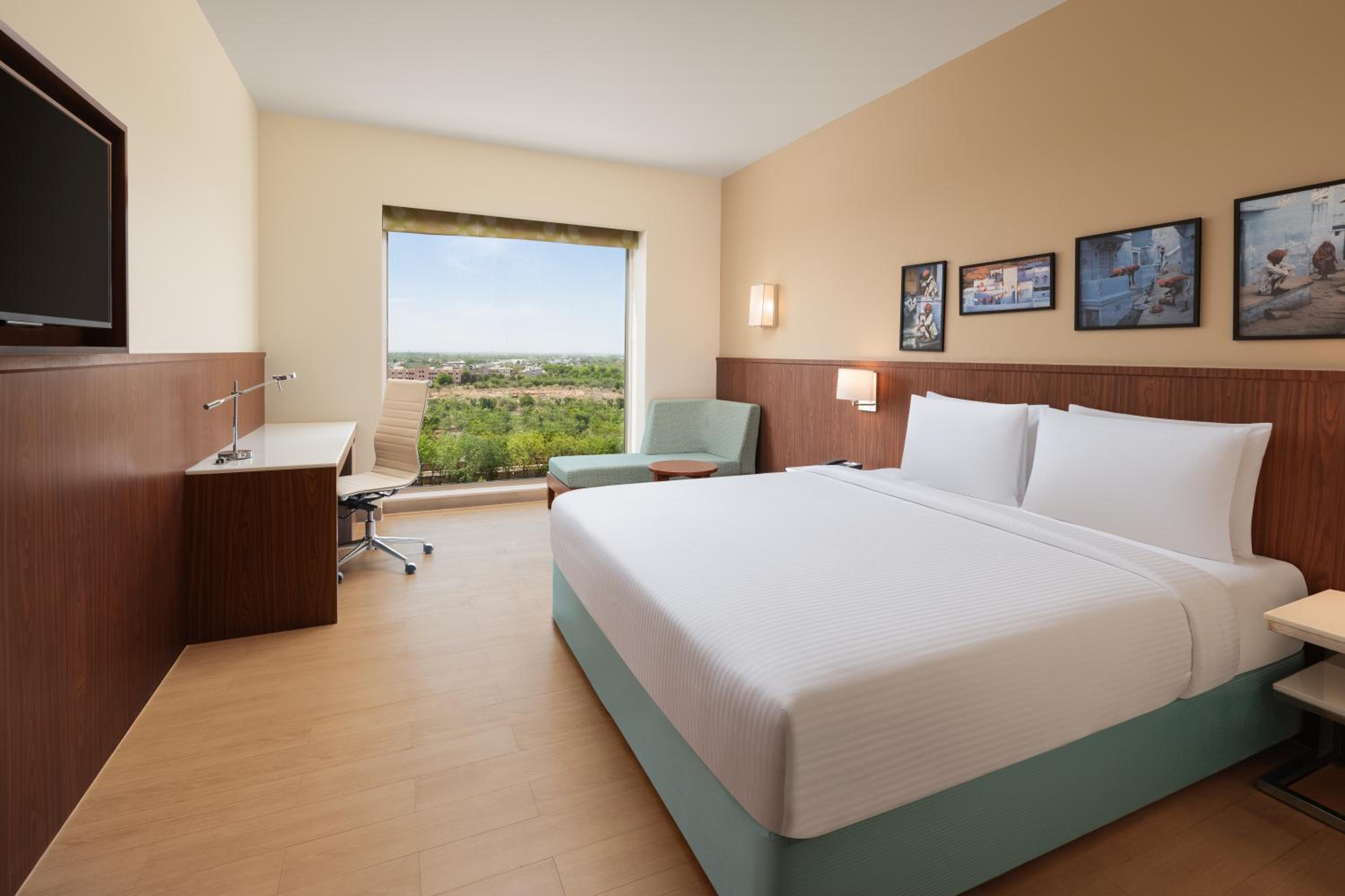 Premium King Room (15% Discount on food & soft beverage at Kava Restaurant, Happy Hours (Buy 1 Get 1) on IMFL beverages at the BAR)