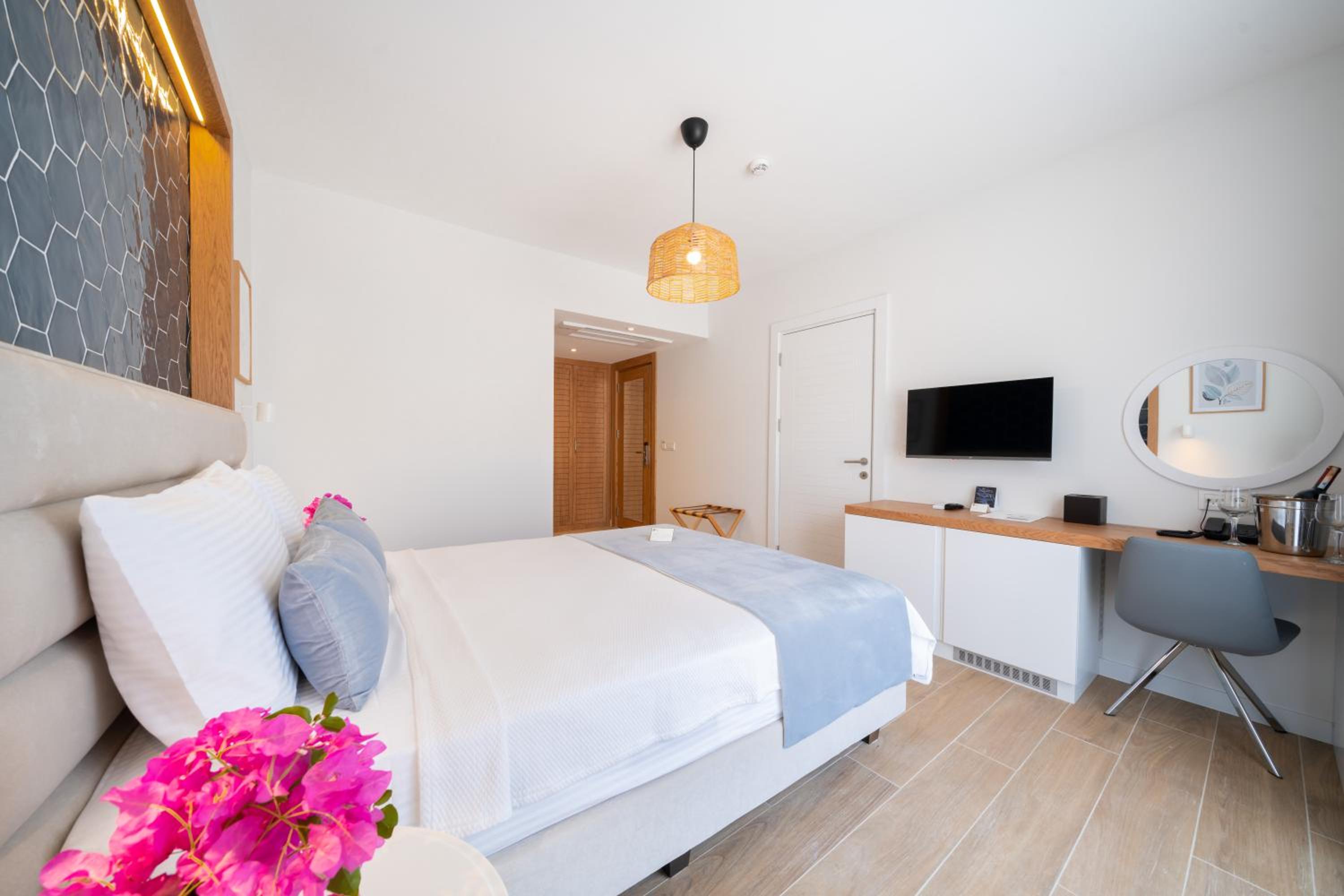 Premium Quadruple Room - Photo 10