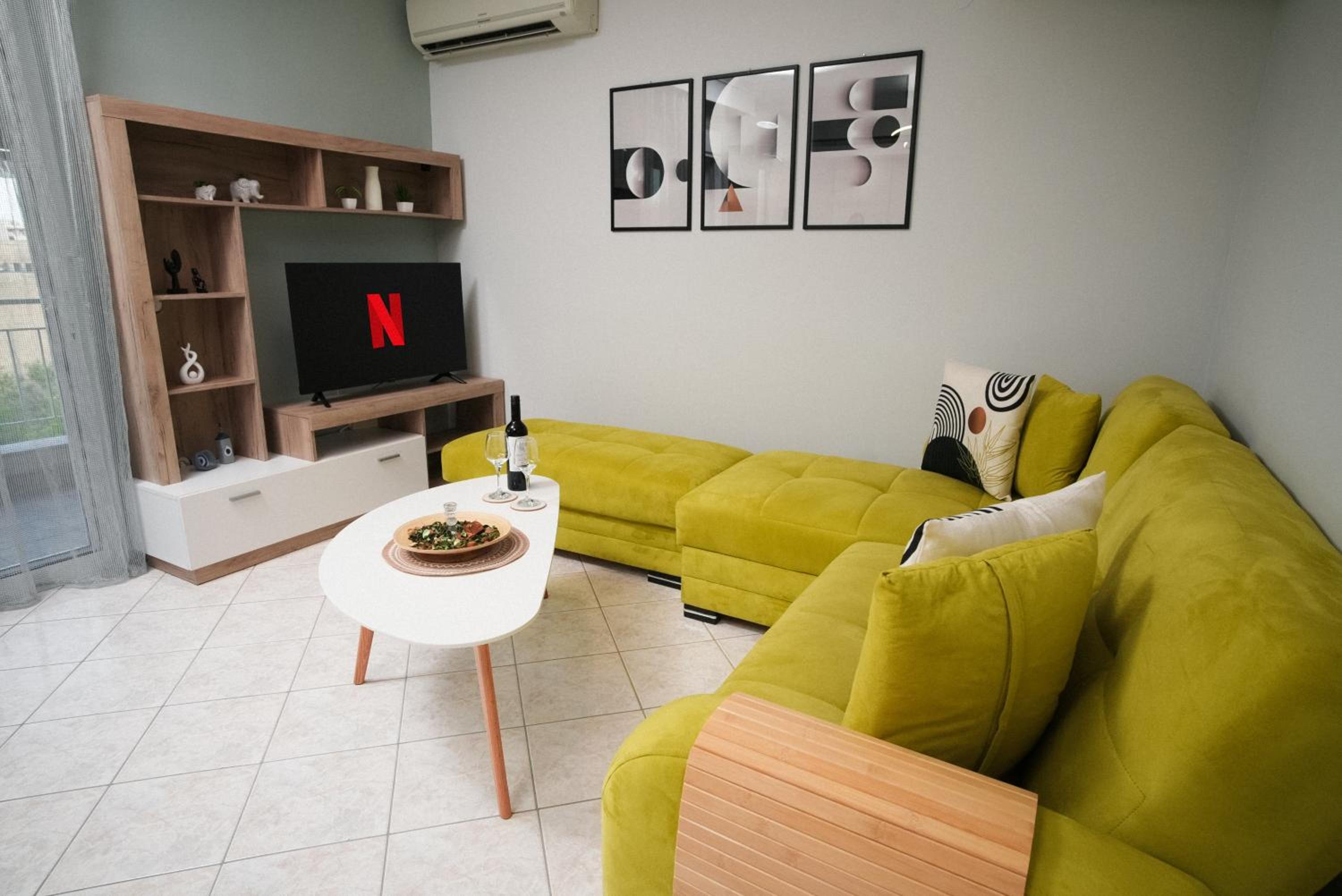 One-Bedroom Apartment with Balcony and City View