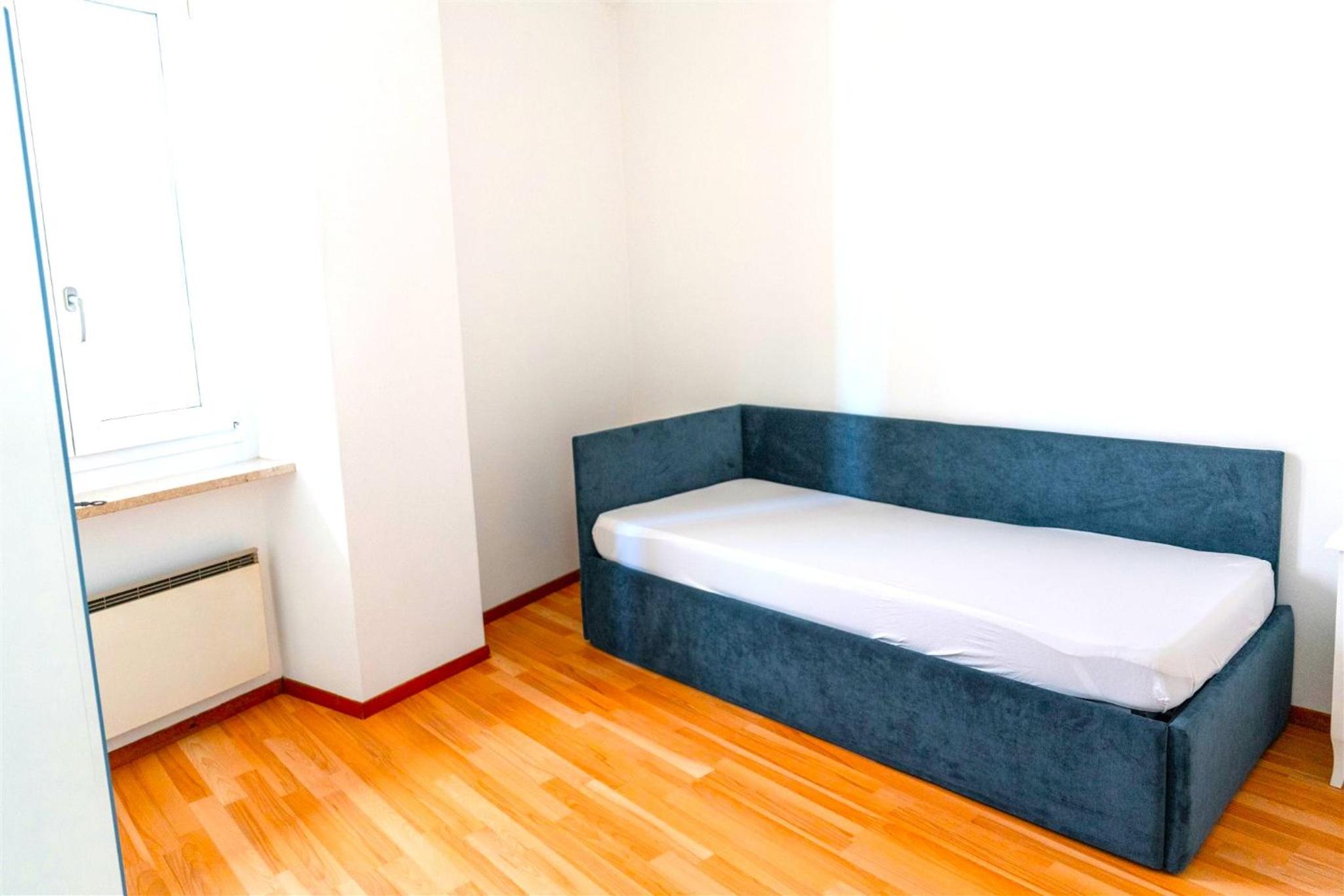 Three-Bedroom Apartment photo 2