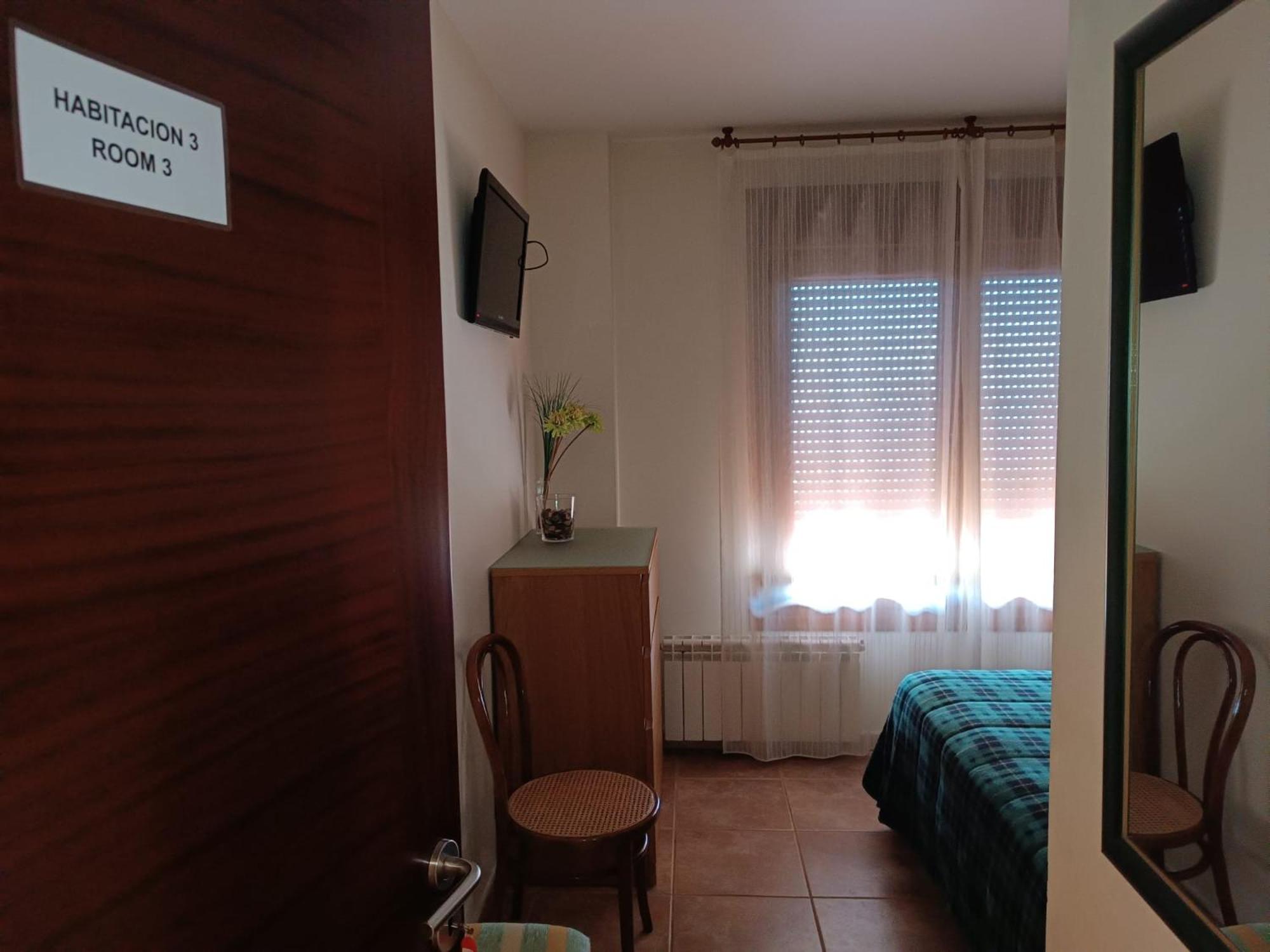 Habitación Estándar con Cama Queen