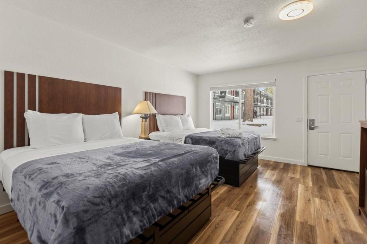 Superior Queen Room with Two Queen Beds - Photo 1