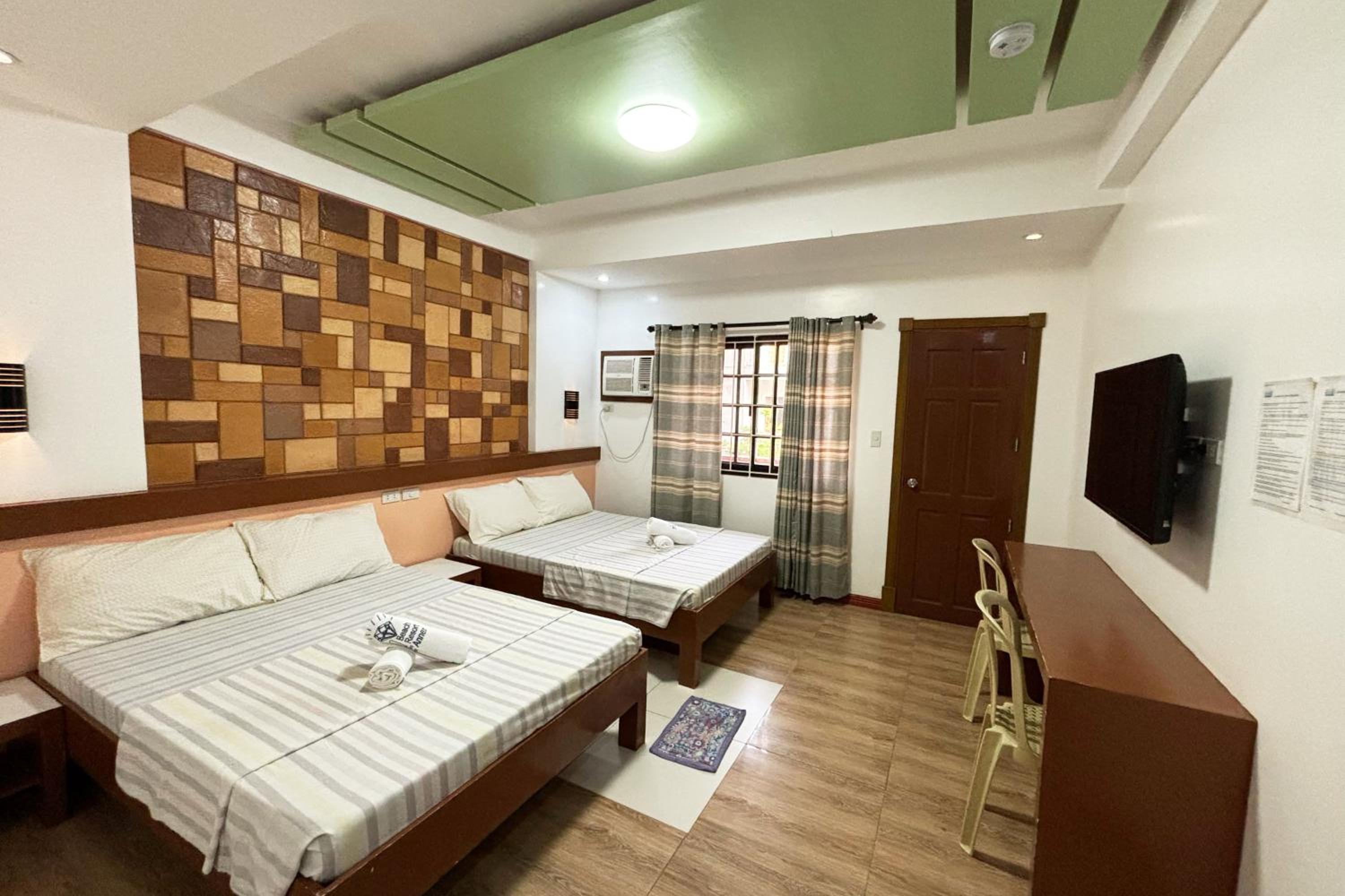 Deluxe Quadruple Room - Photo 3