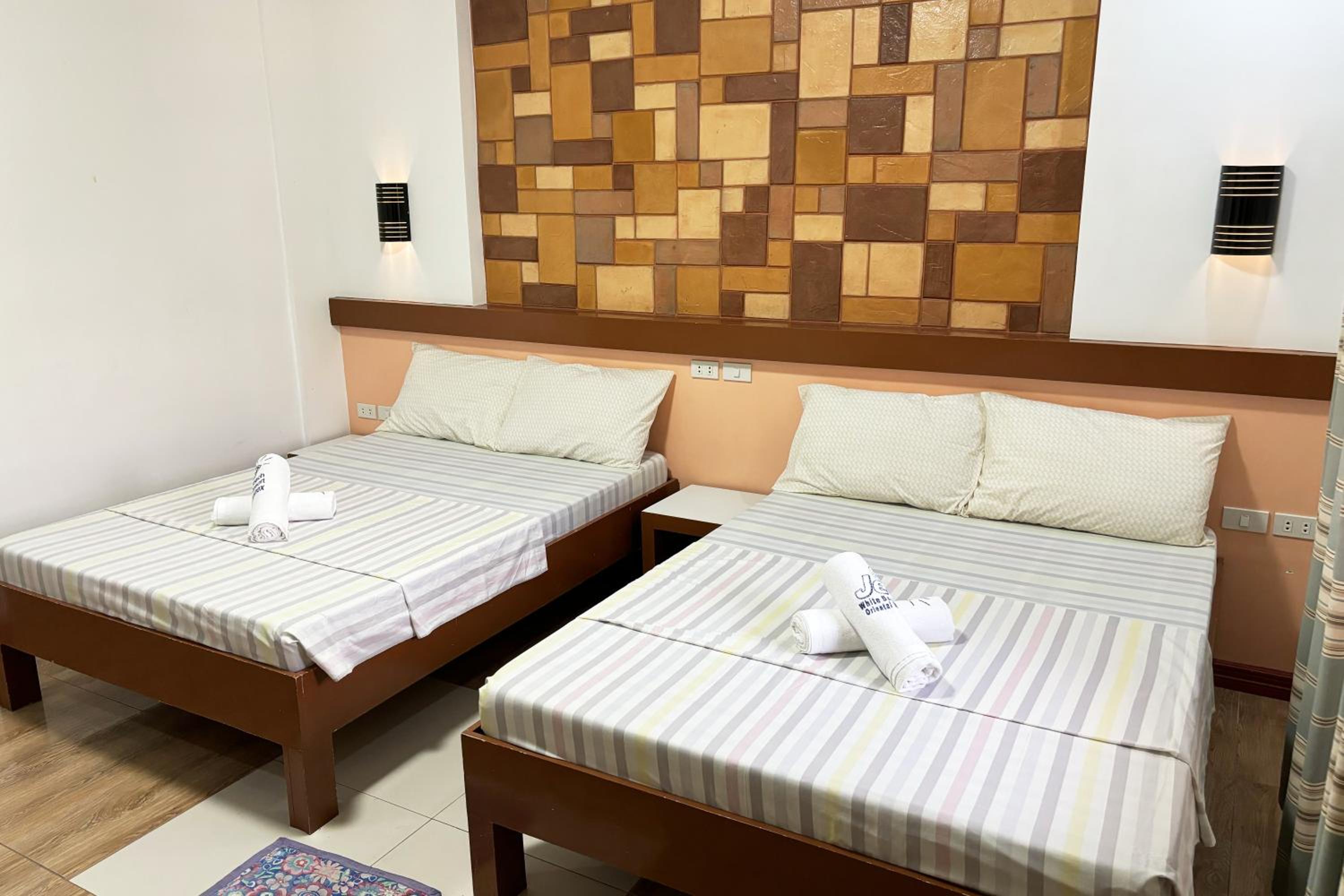 Deluxe Quadruple Room - Photo 15