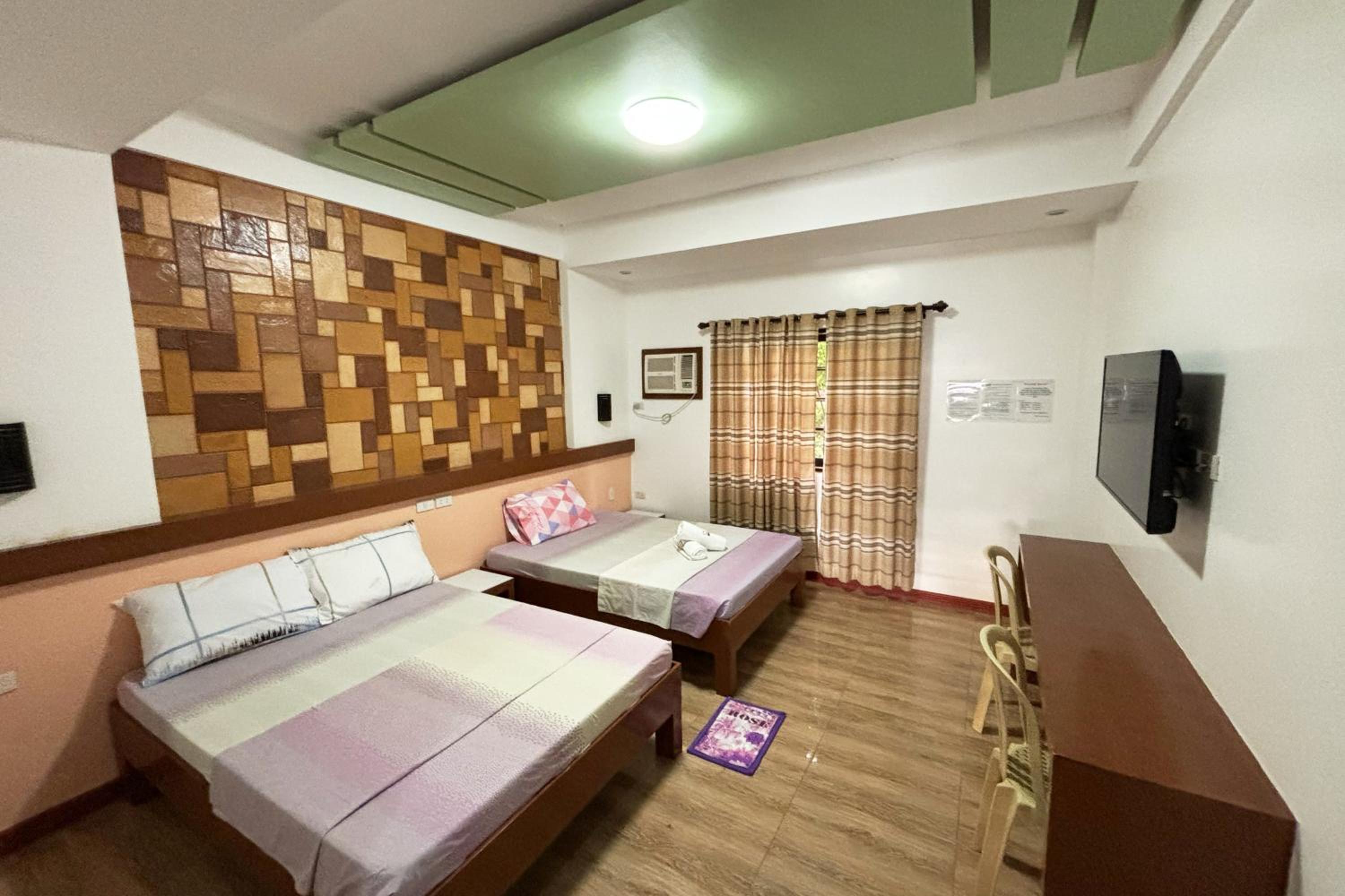 Standard Quadruple Room - Photo 18