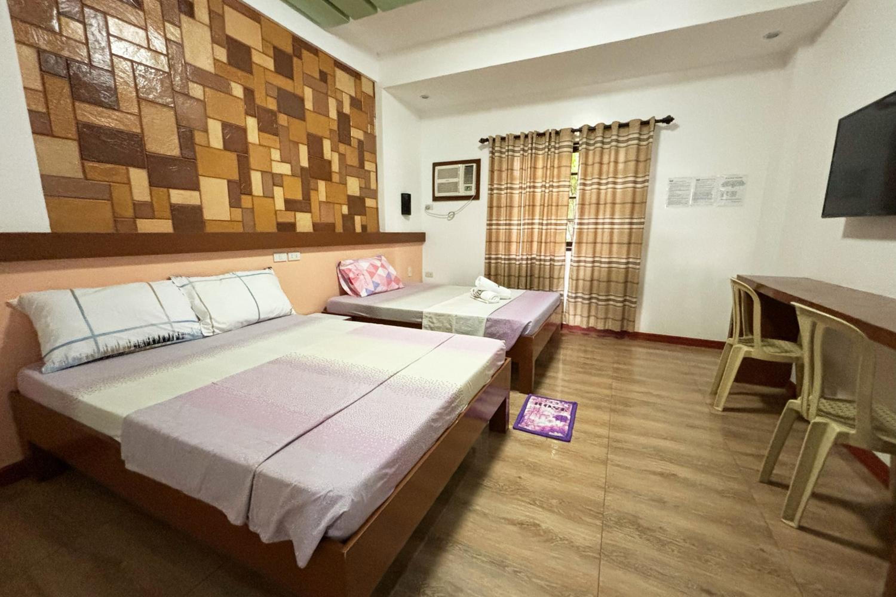 Standard Quadruple Room - Photo 11