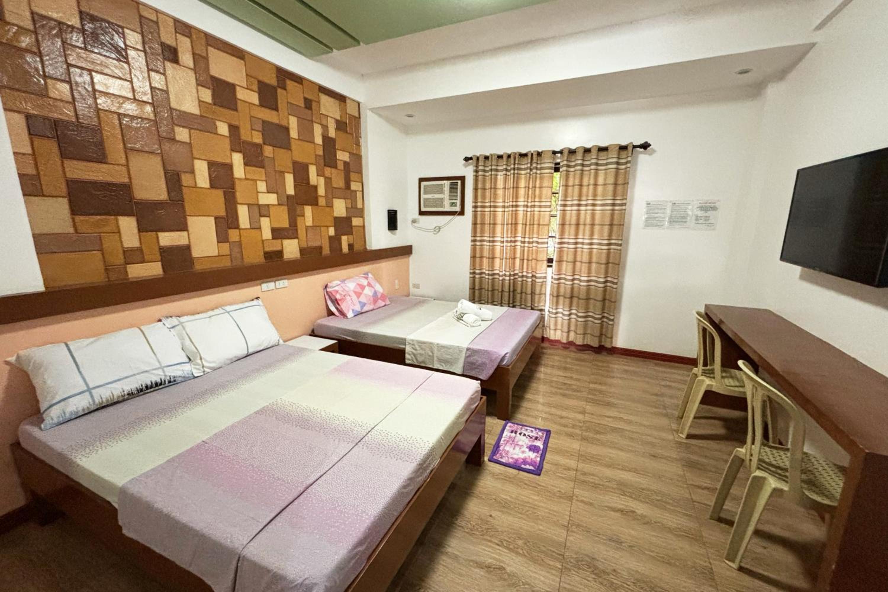 Standard Quadruple Room - Photo 13