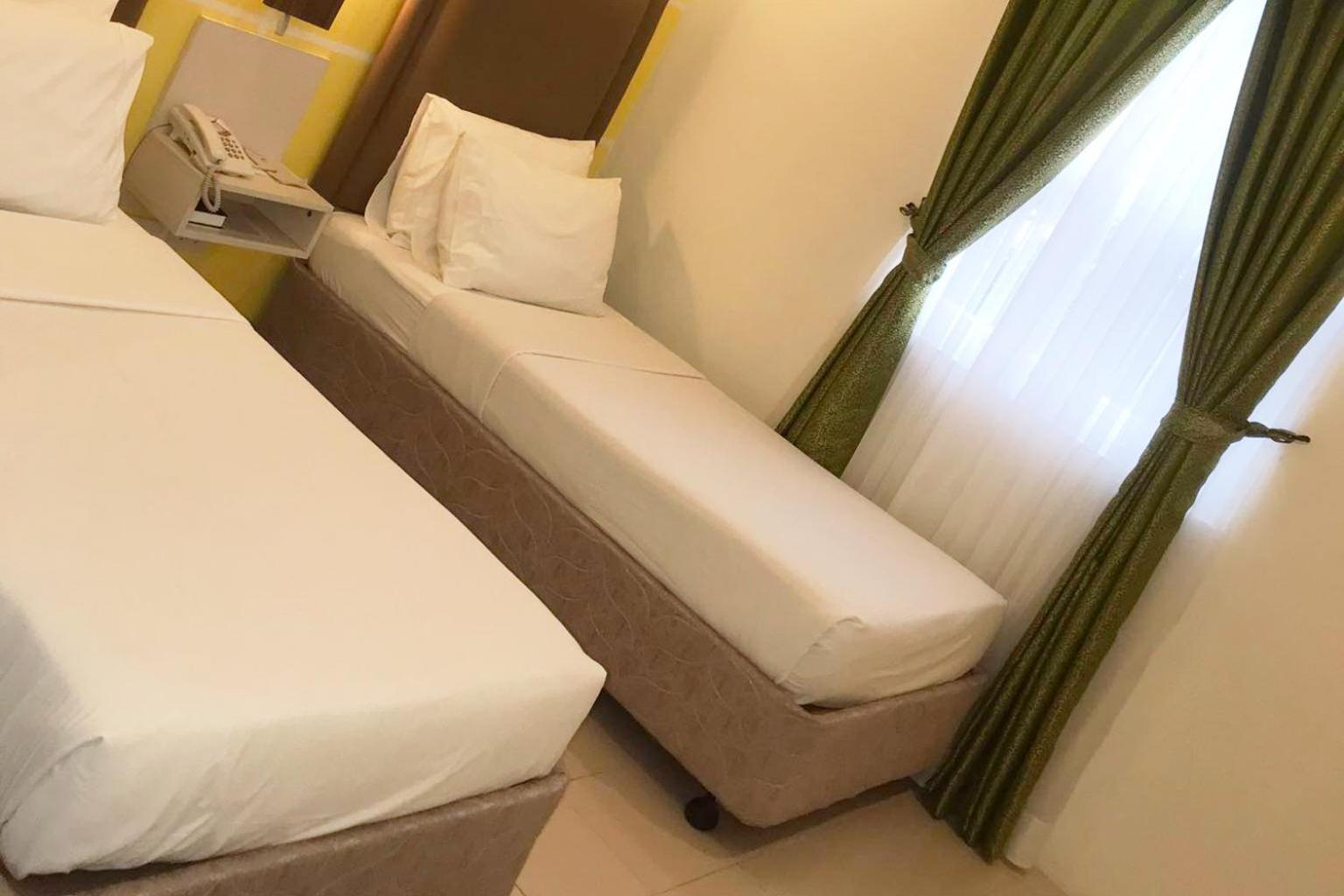 Deluxe Twin Room - Photo 7
