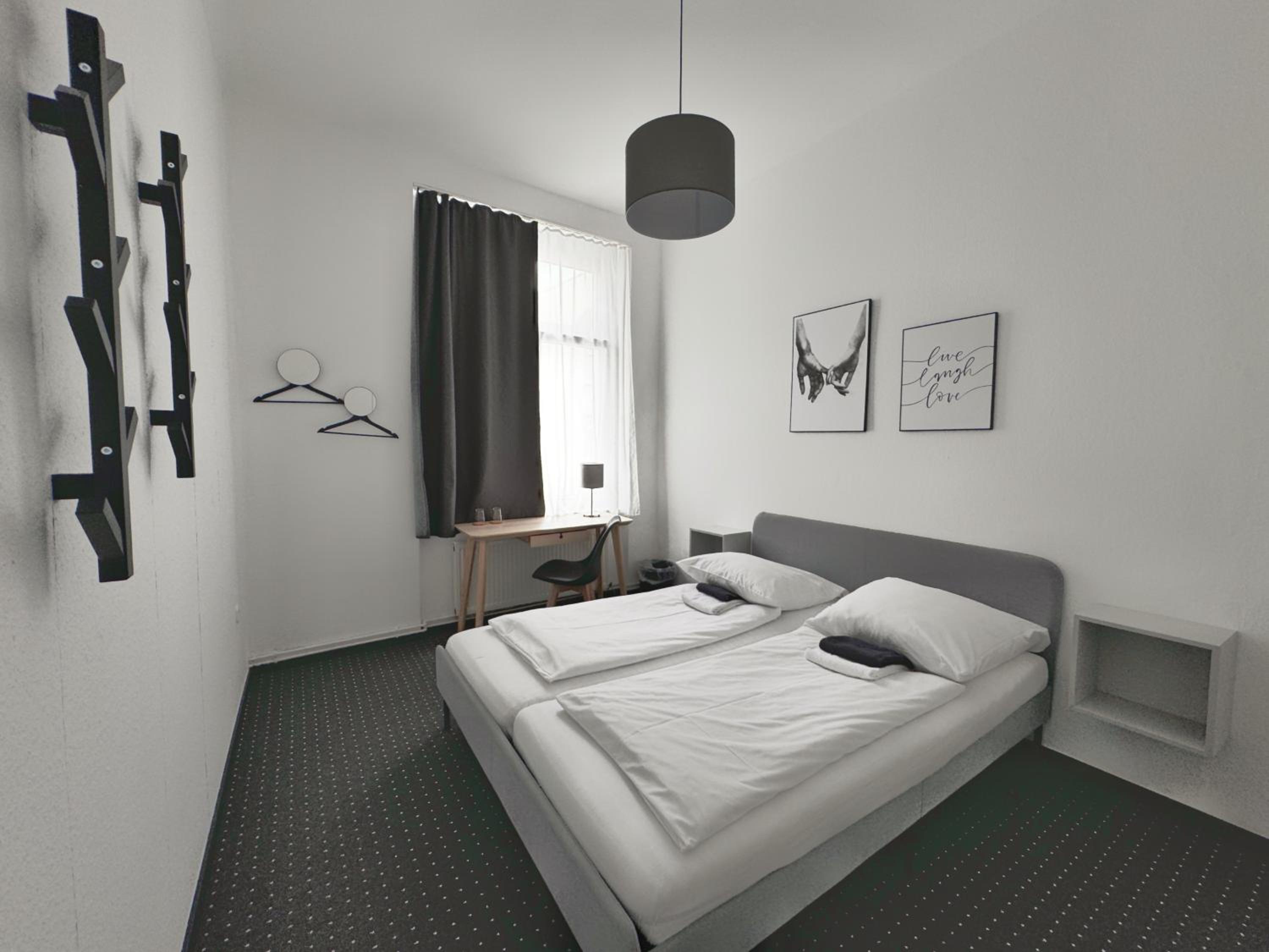 Economy Double Room with Shared Bathroom thumbnail 5