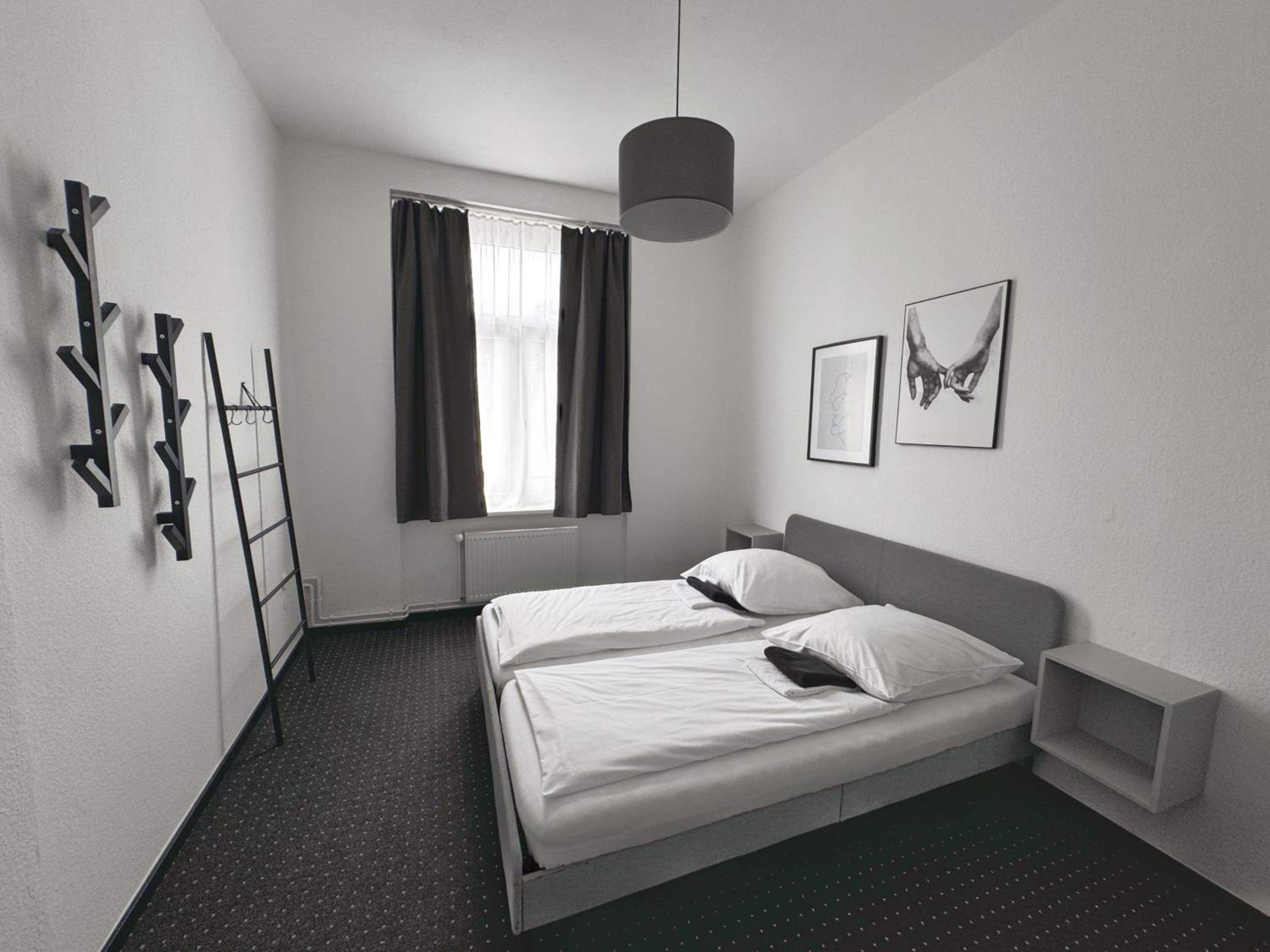 Economy Double Room with Shared Bathroom thumbnail 6