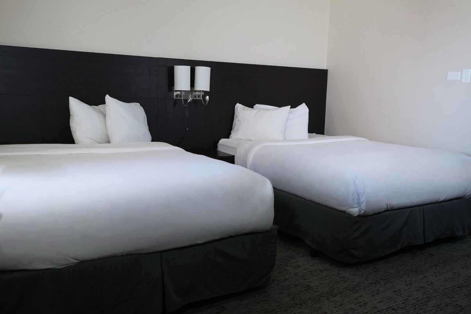Queen Room with Two Queen Beds - Photo 1