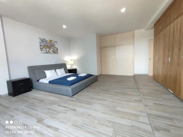Three-Bedroom Apartment photo 1