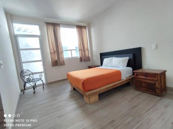 Three-Bedroom Apartment photo 2