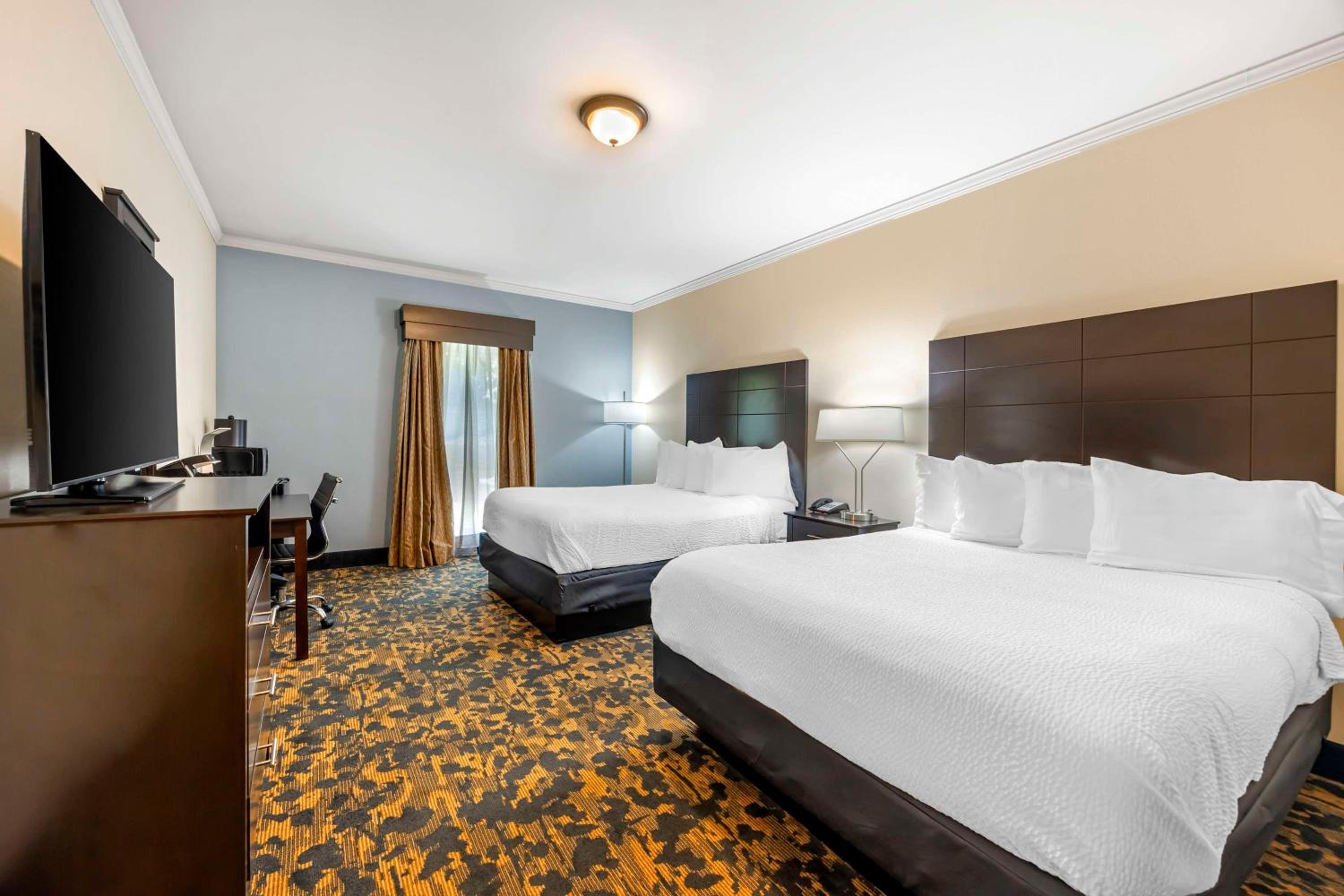 Queen Room with Two Queen Beds - Shower Only - Photo 1