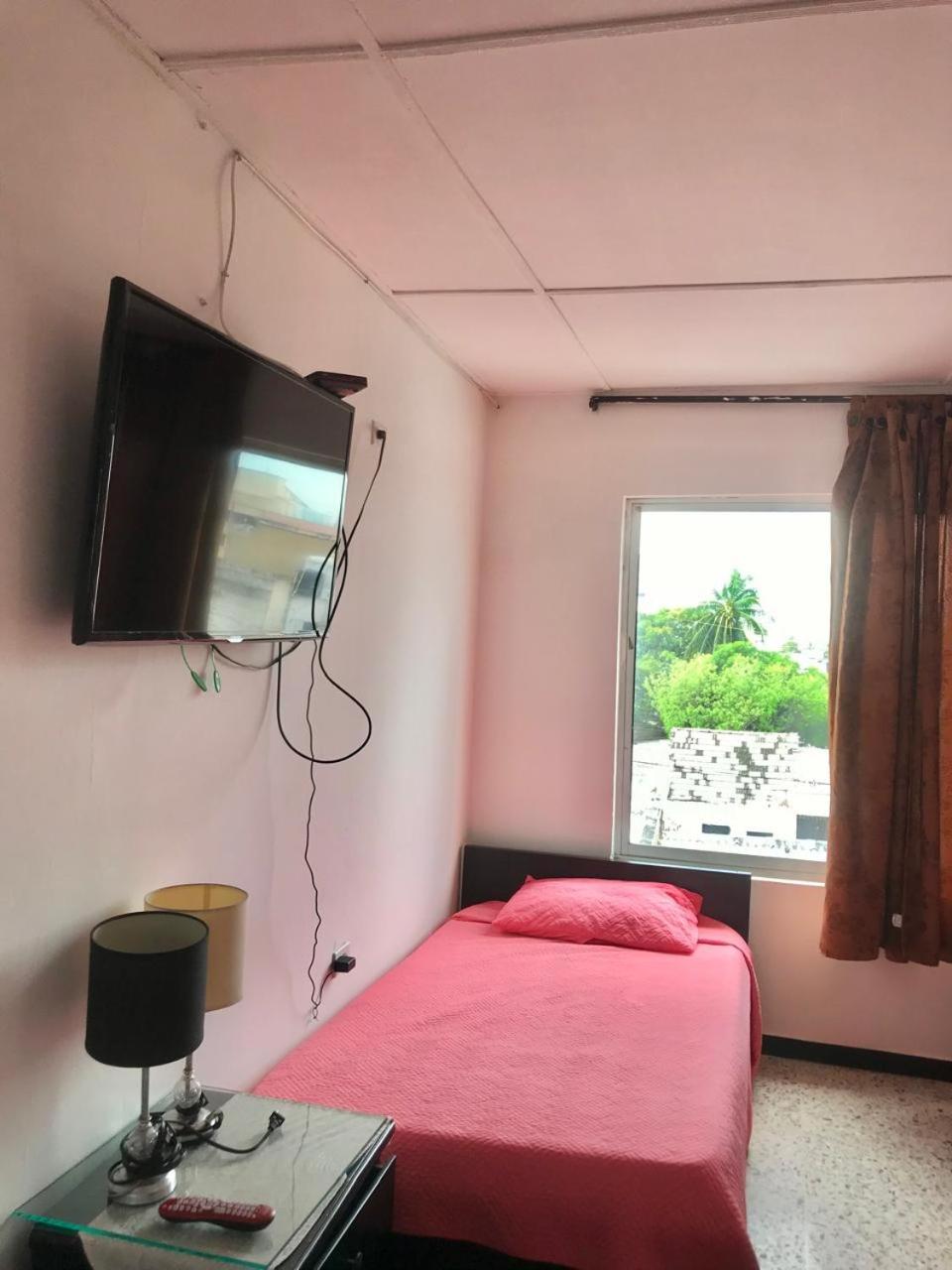 Economy Triple Room photo 2