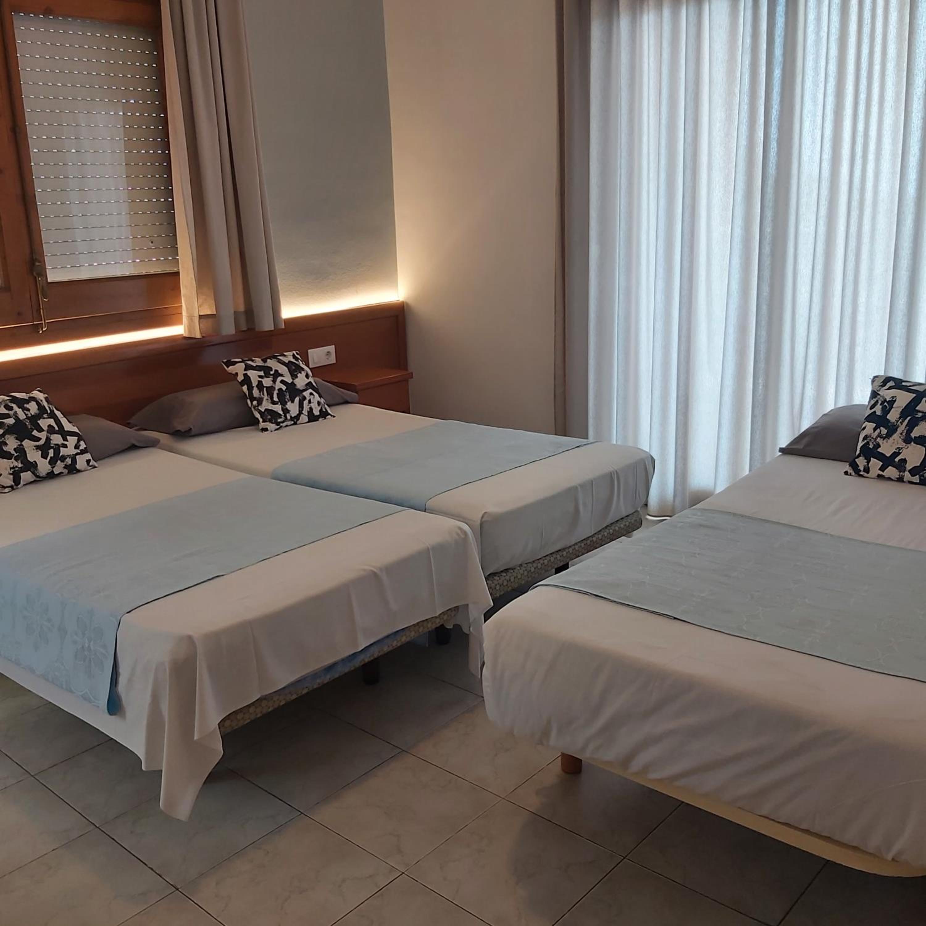 Habitación triple con terraza