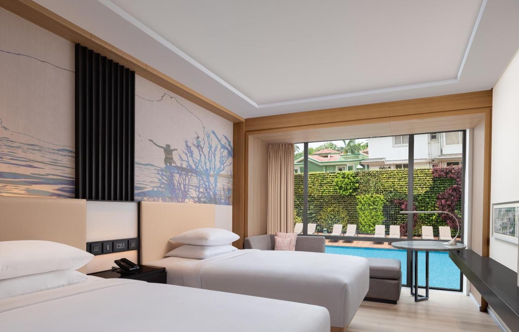 Deluxe Guest room, 2 Queen, Partial pool view with INR 500 Spa credit on min therapy of 60 mins per stay - Photo 3