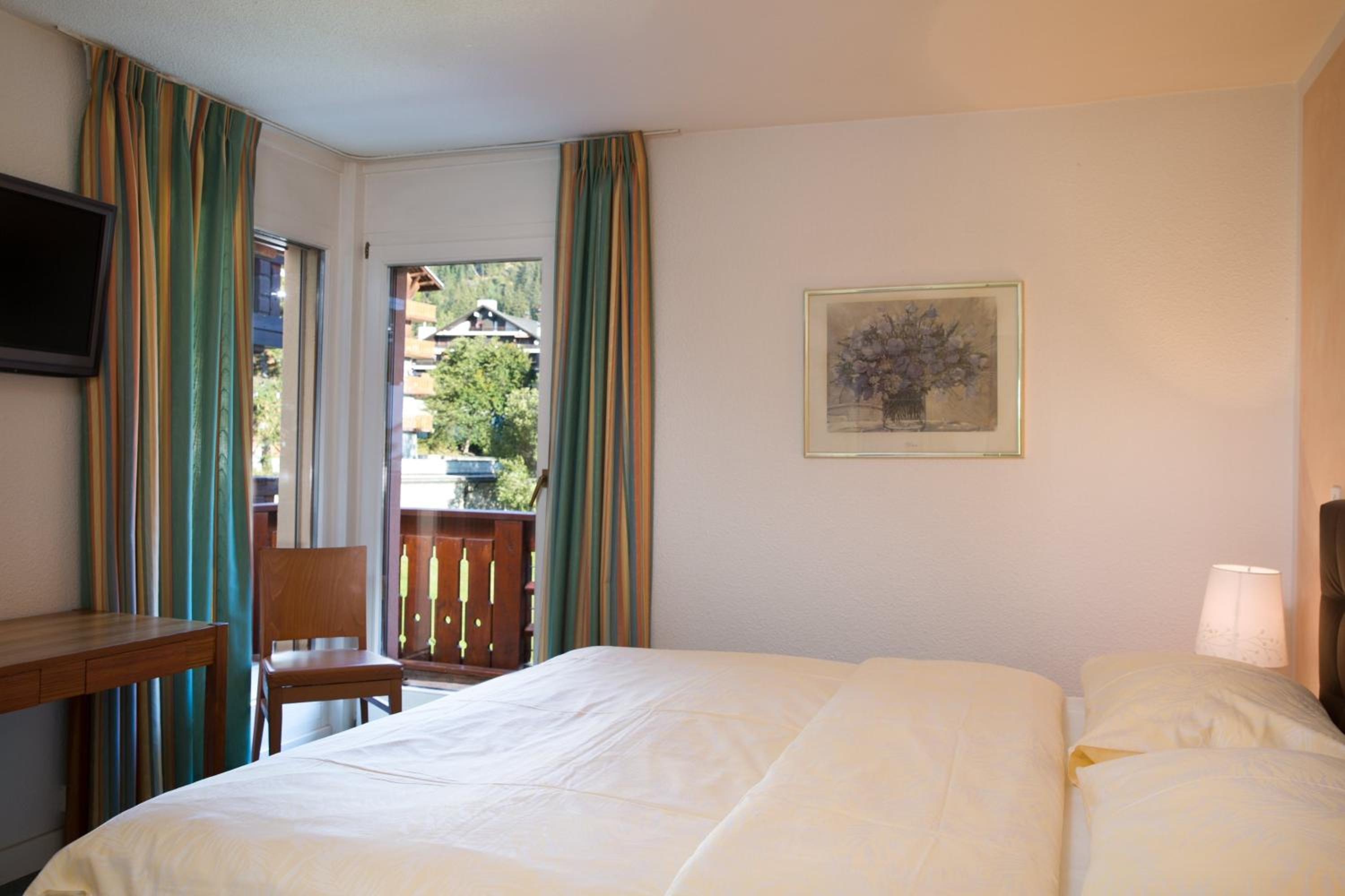 Two-Bedroom Suite with Balcony and Mountain View