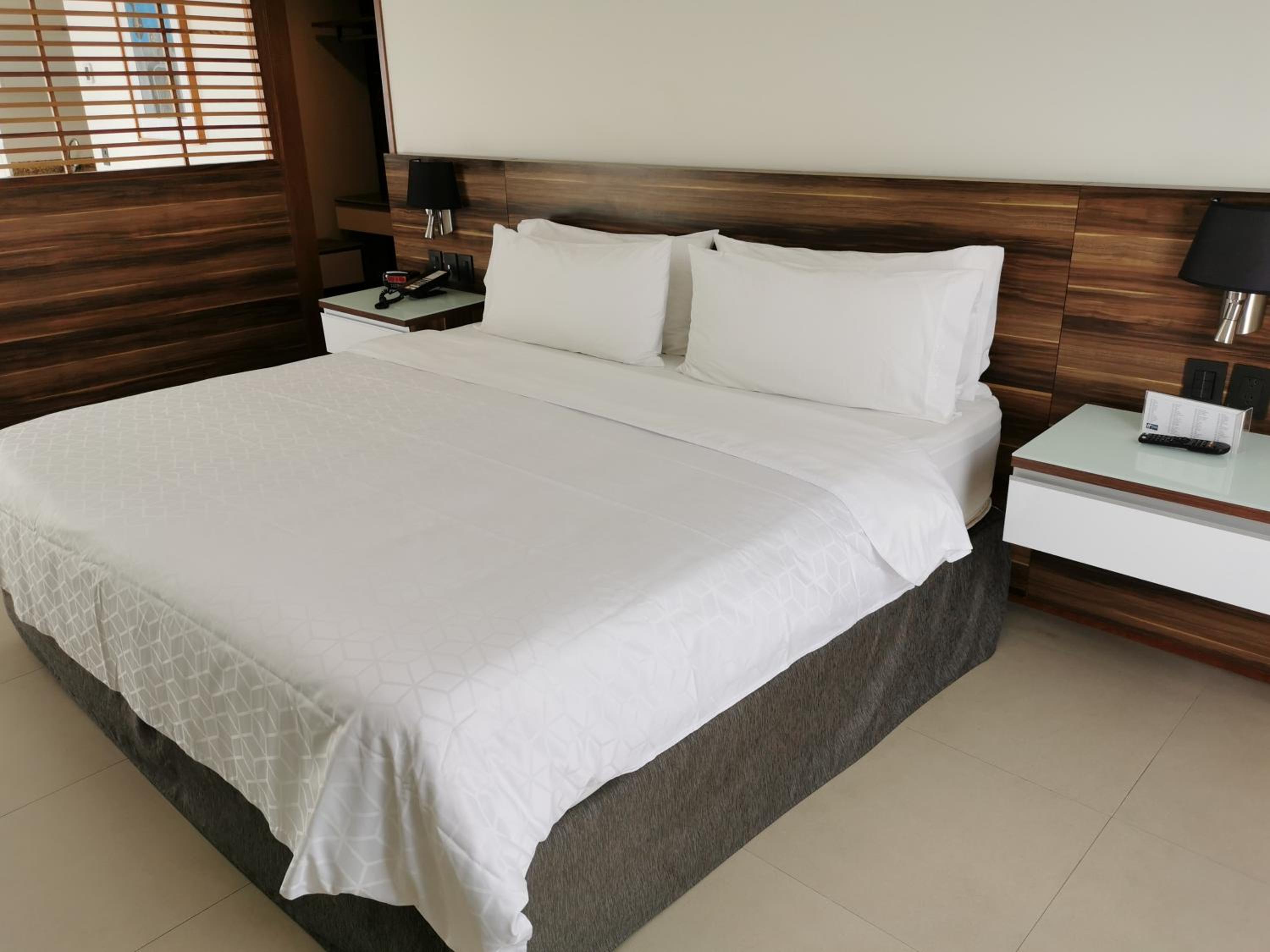 King Suite with Balcony and City View - Top Floor