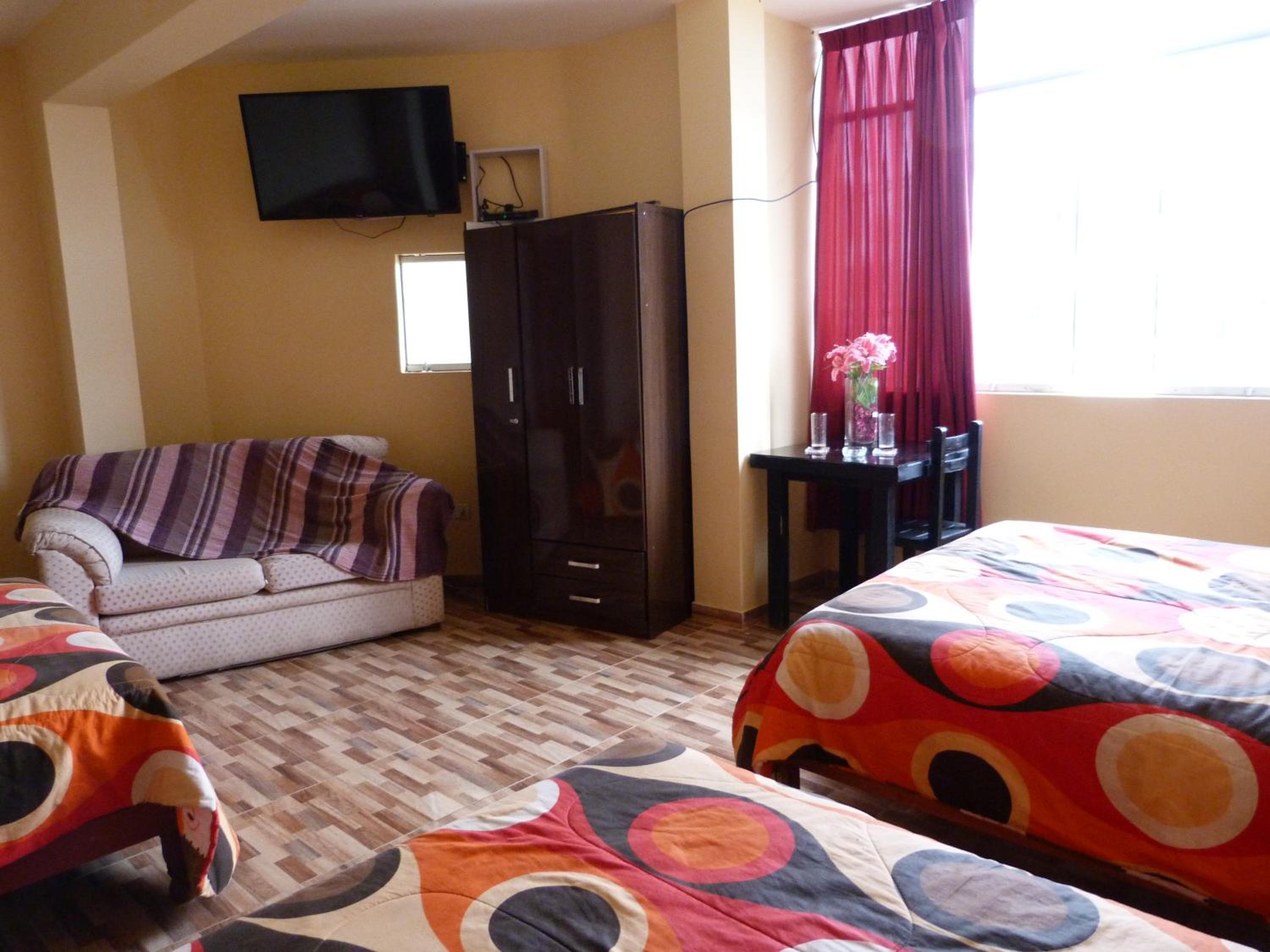 Quadruple Room with Private Bathroom photo 1