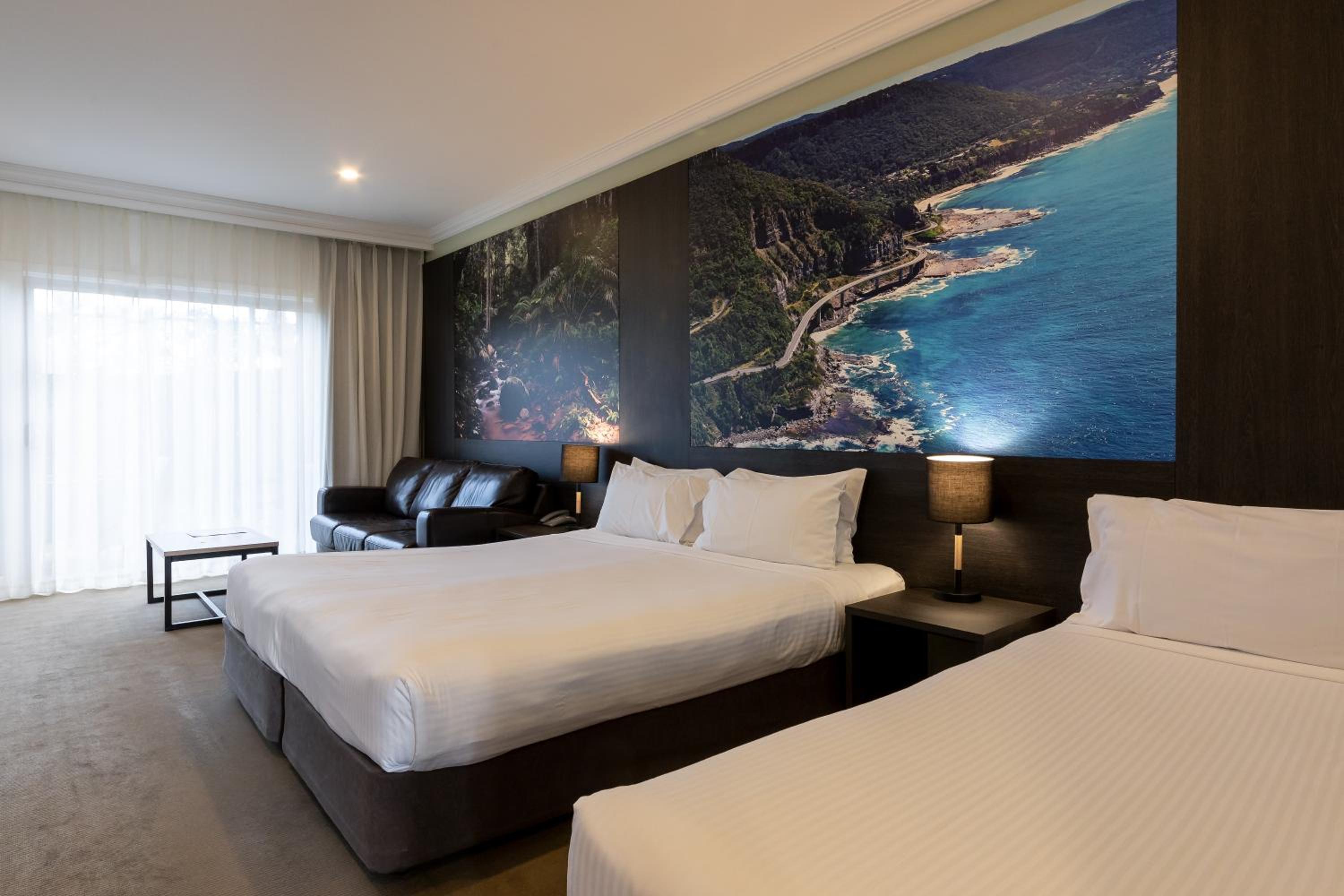 Superior Room with One King Bed and One Double Bed and Balcony - Photo 2